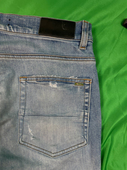 Amiri MX1 Orange Crackle Patch Light Wash Blue Jeans