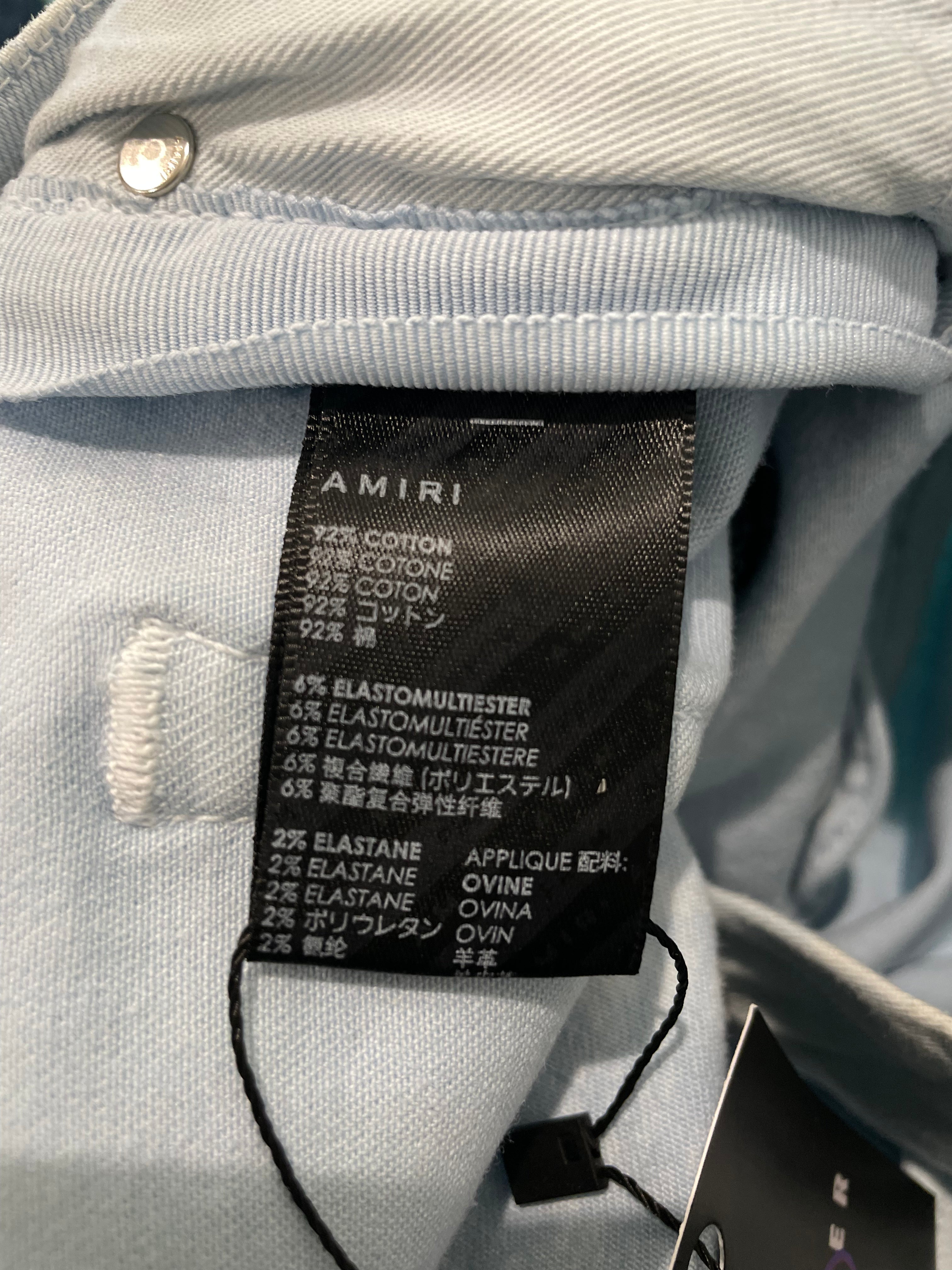 Amiri MX1 Ripped Powder Blue Jeans