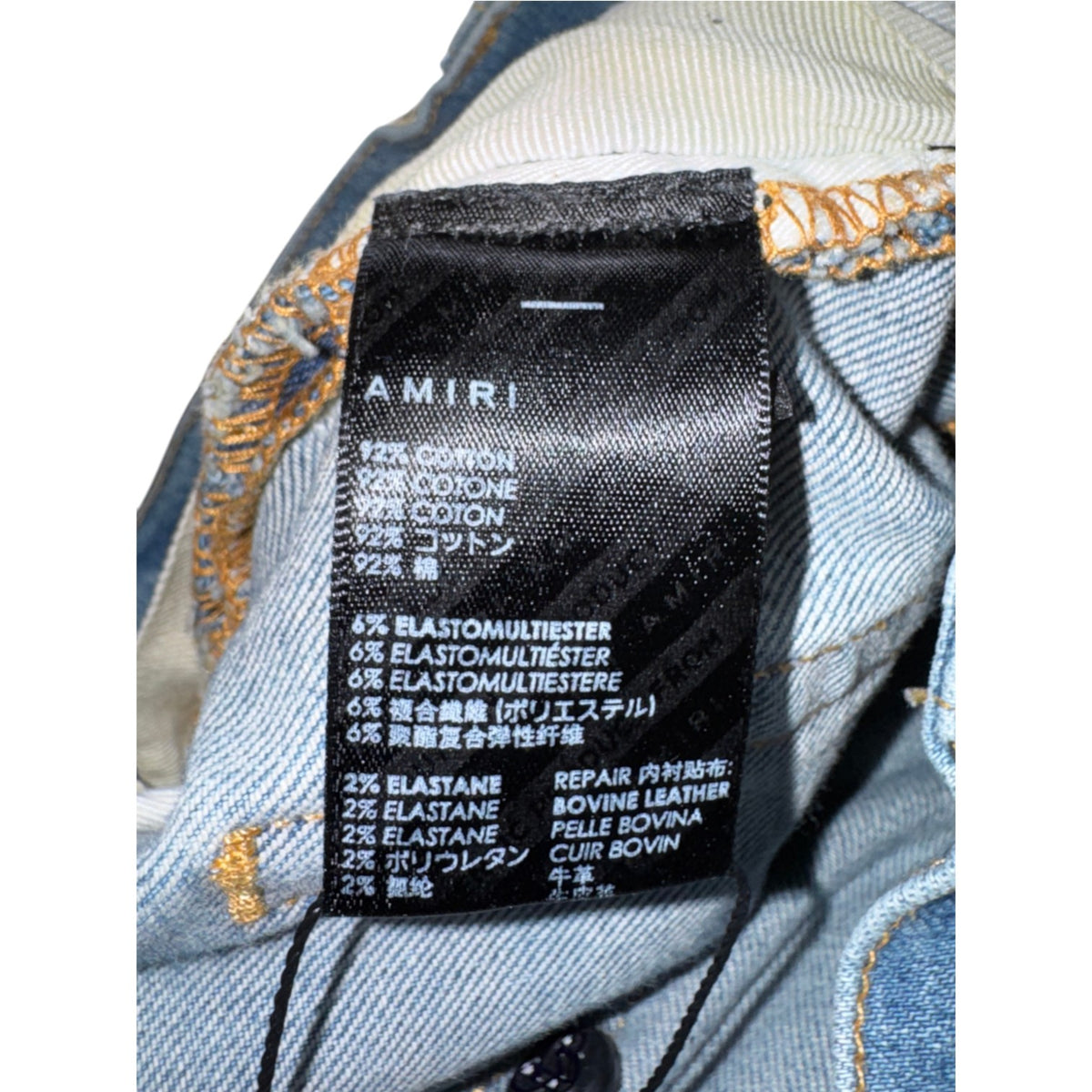 Amiri "MX1" Crackle Light Wash & Orange Jeans