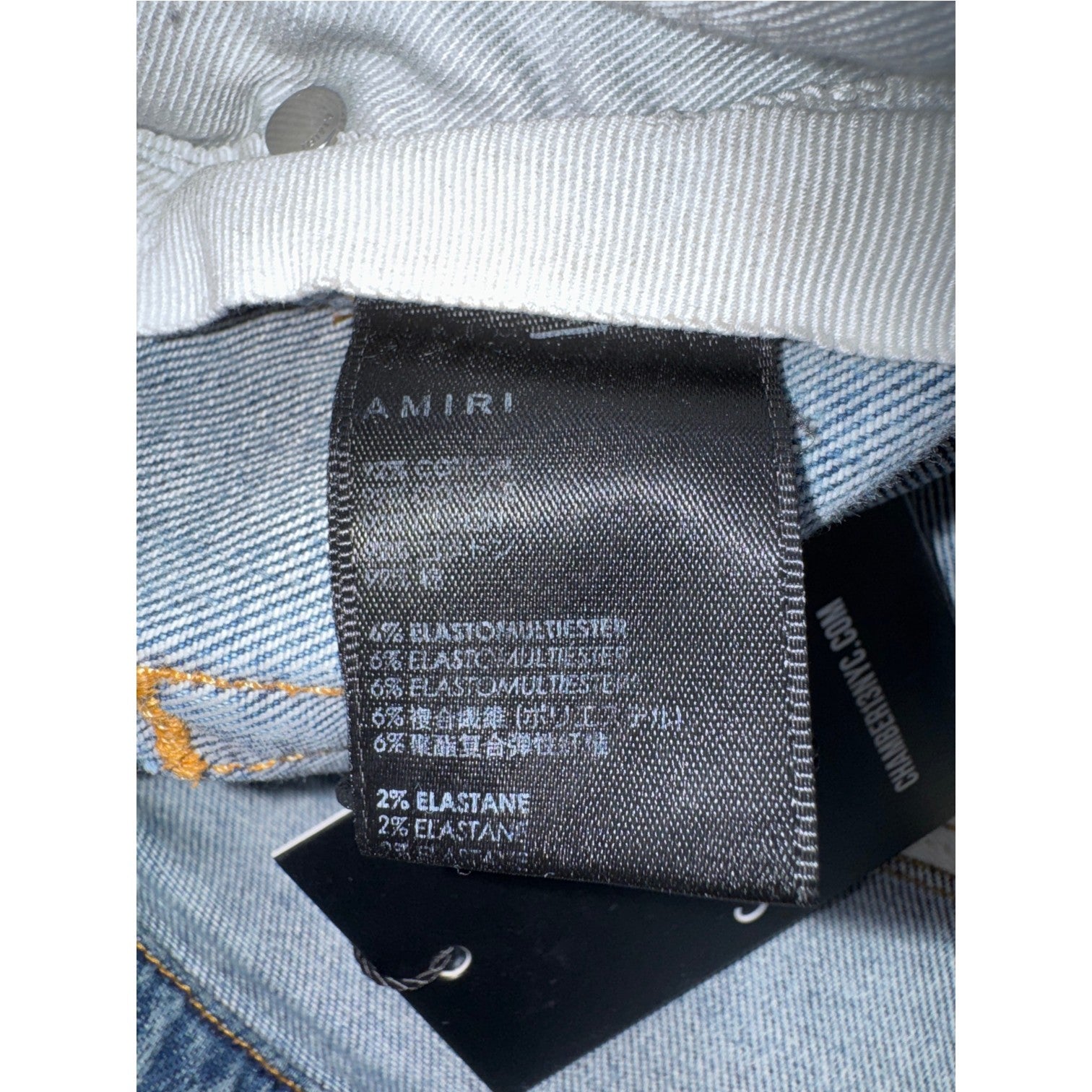 Amiri Button Snap Flare Stacked Light Wash Jeans
