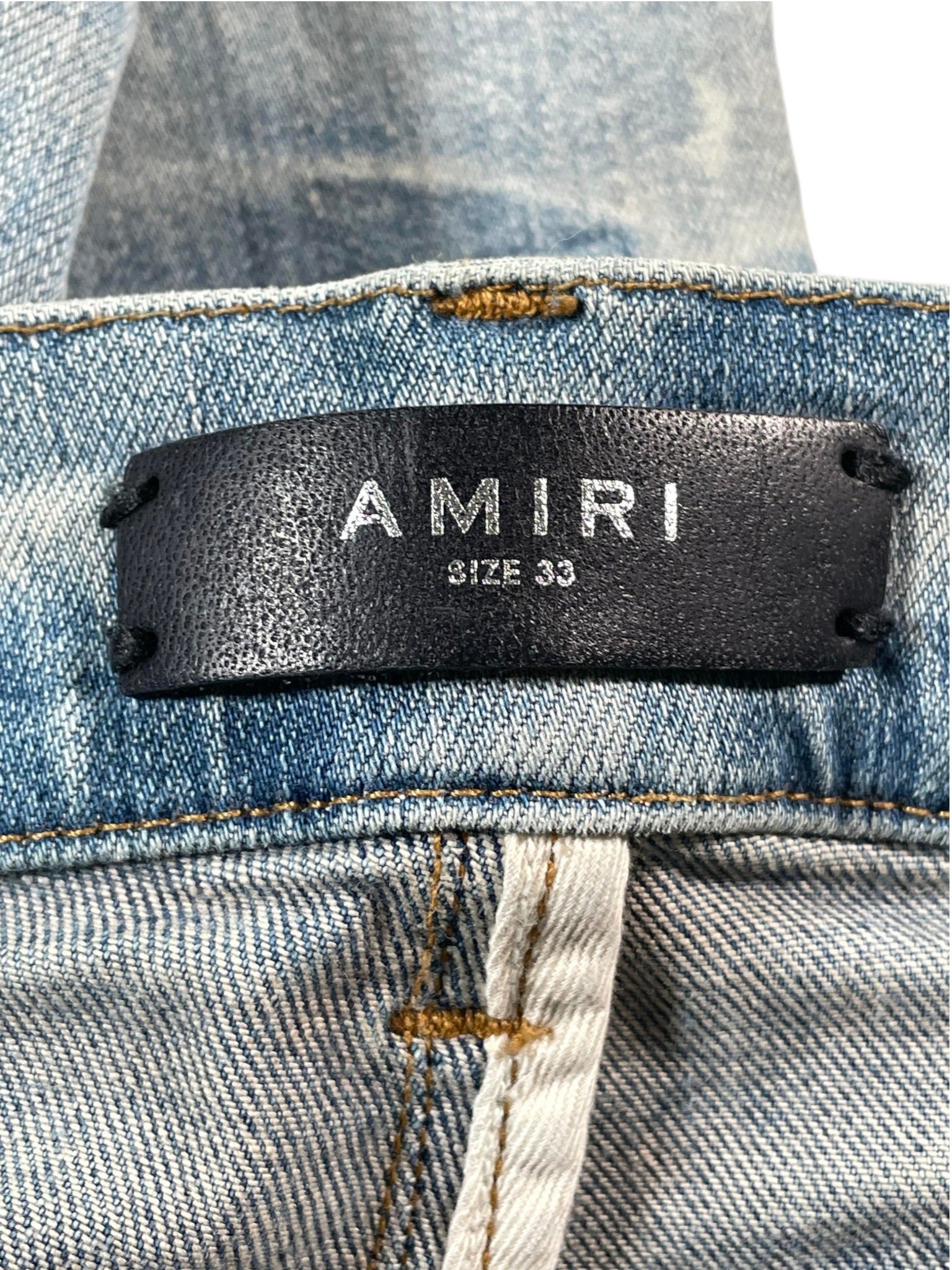Amiri Desert Camo Patchwork Light Wash Jeans