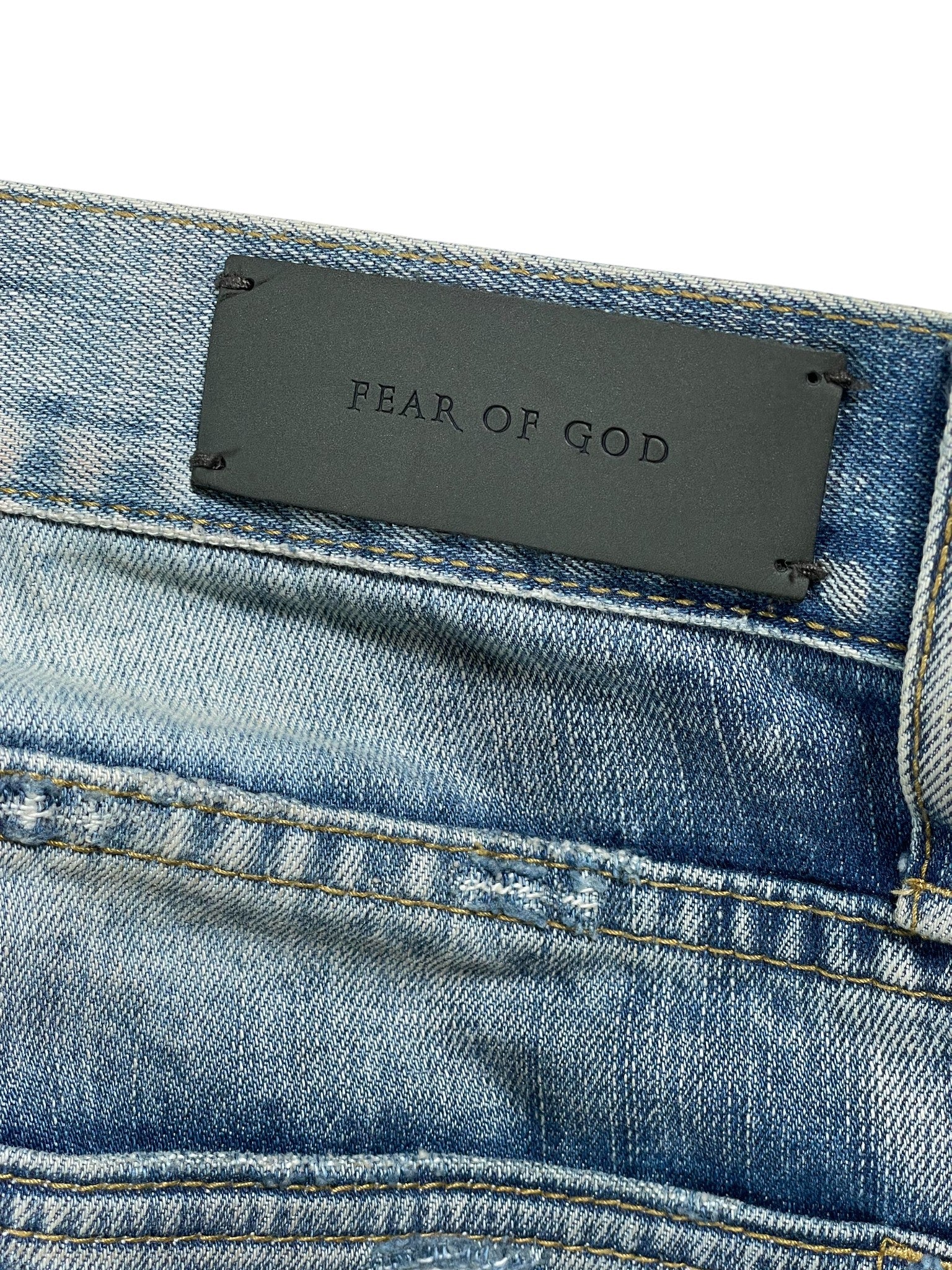 Fear of God Light Wash Ripped Jeans