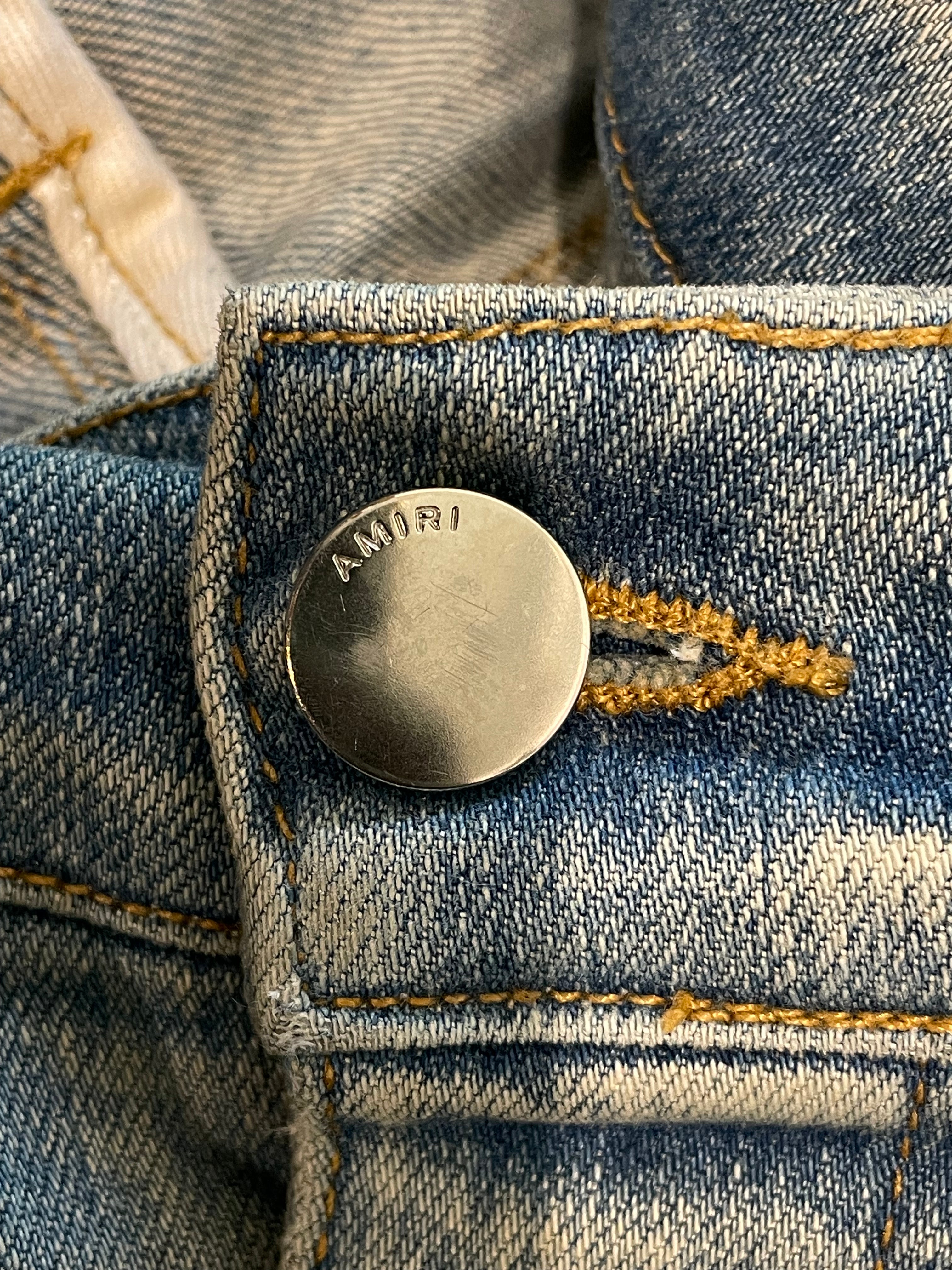 Amiri White Side Logo Light Wash Blue Jeans