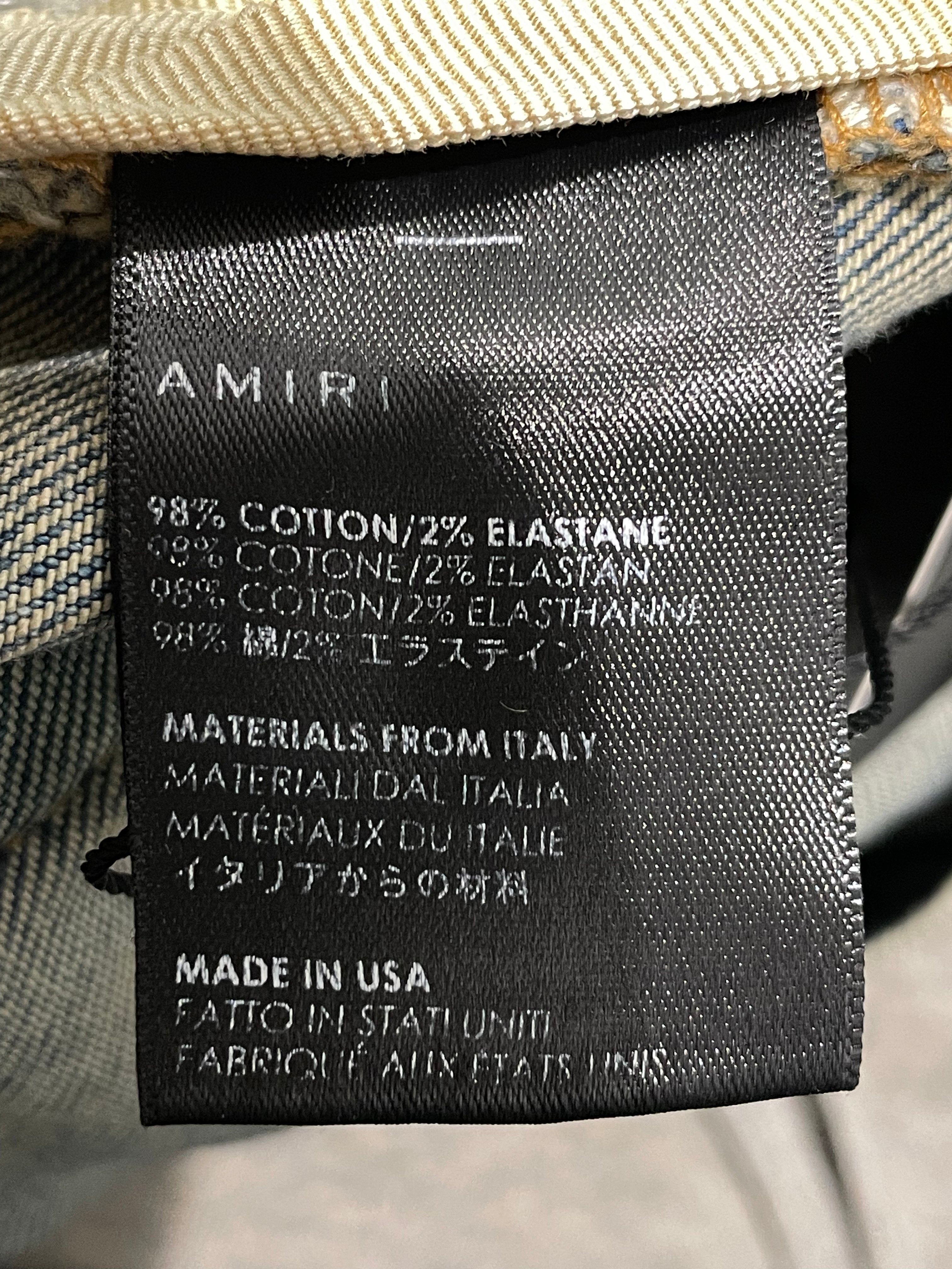 Amiri Knee Rip Vintage Wash Blue Jeans