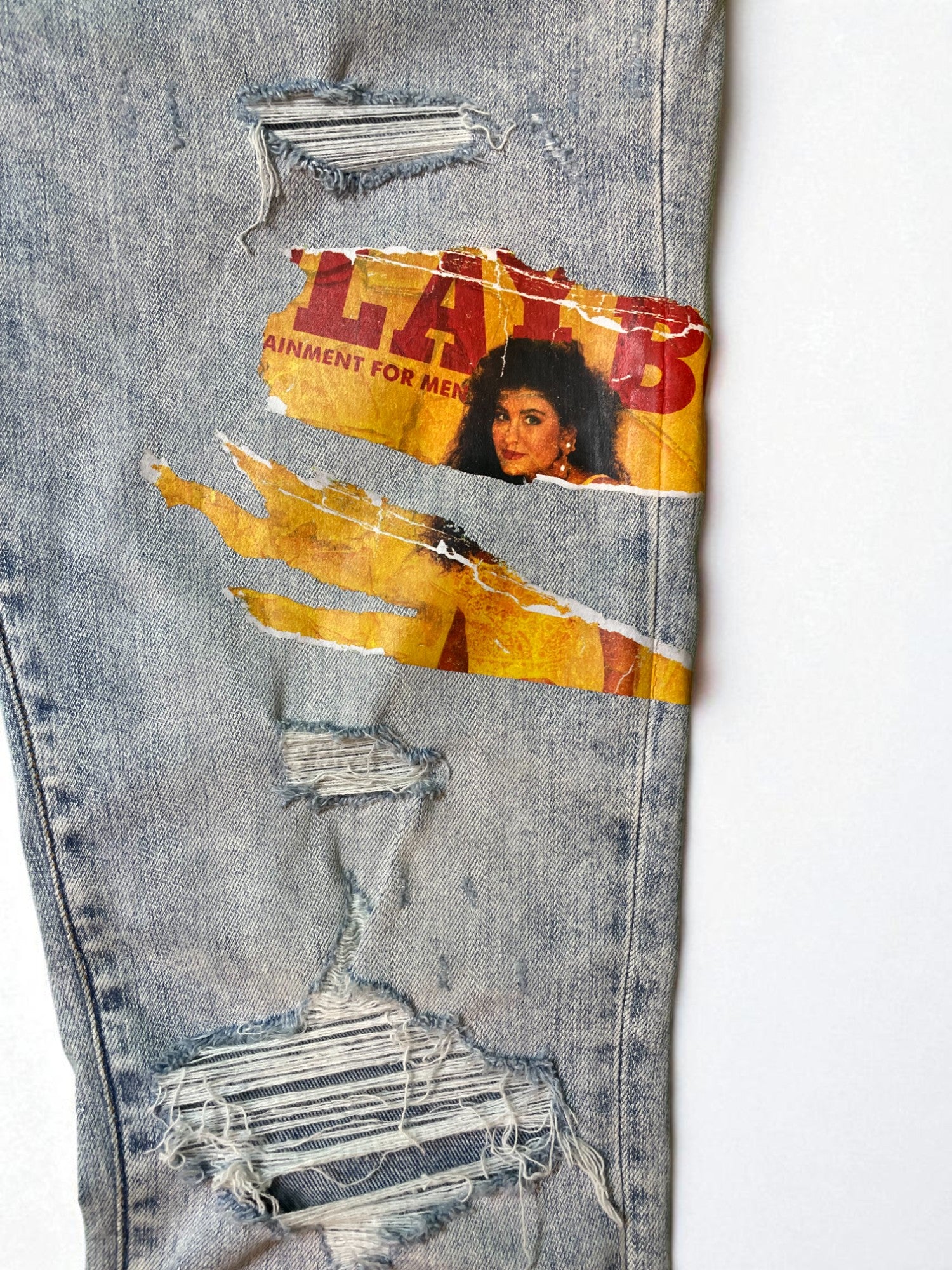 Amiri Playboy Magazine Light Wash Blue Jeans