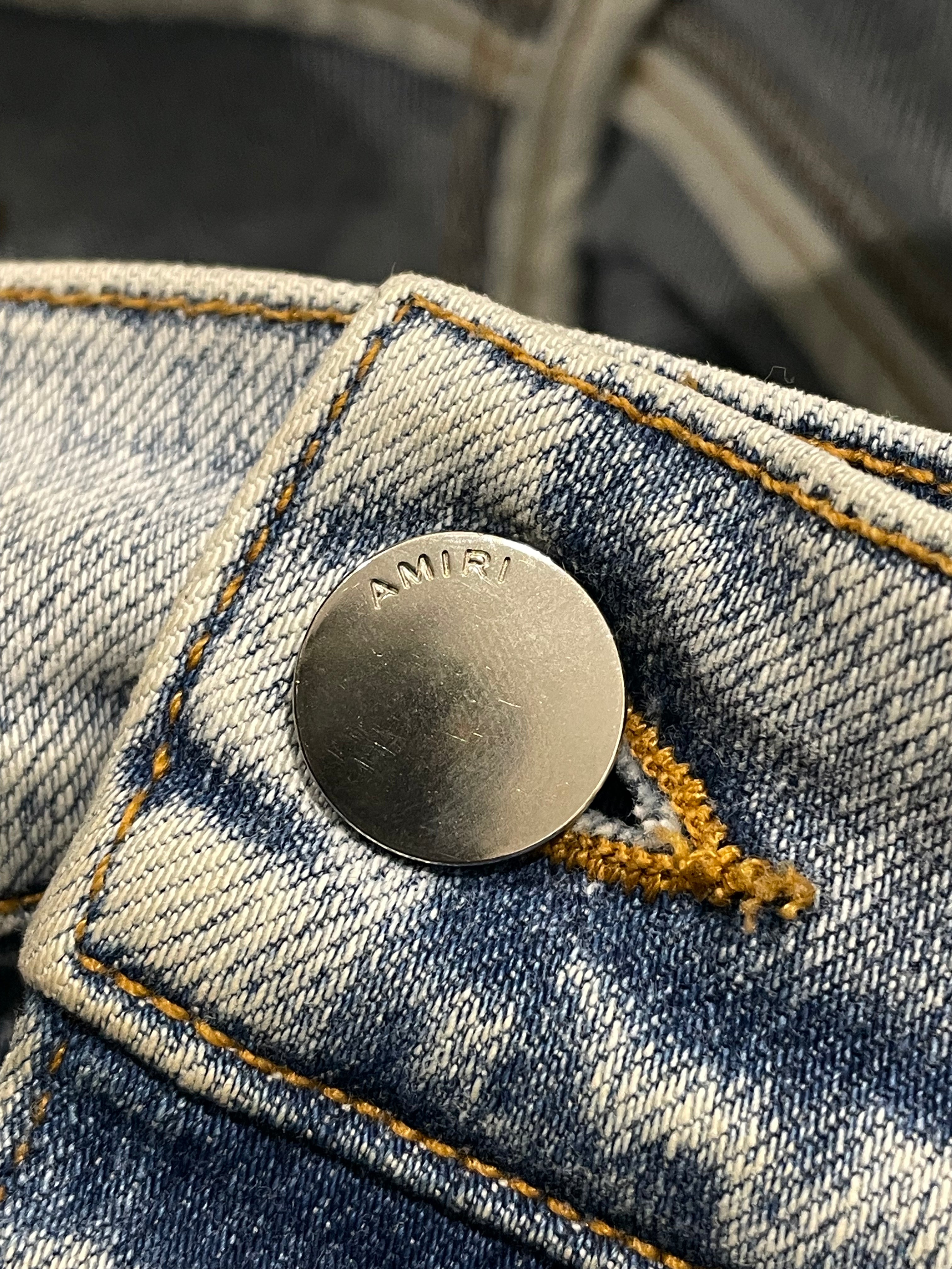 Amiri Playboy Magazine Light Wash Blue Jeans