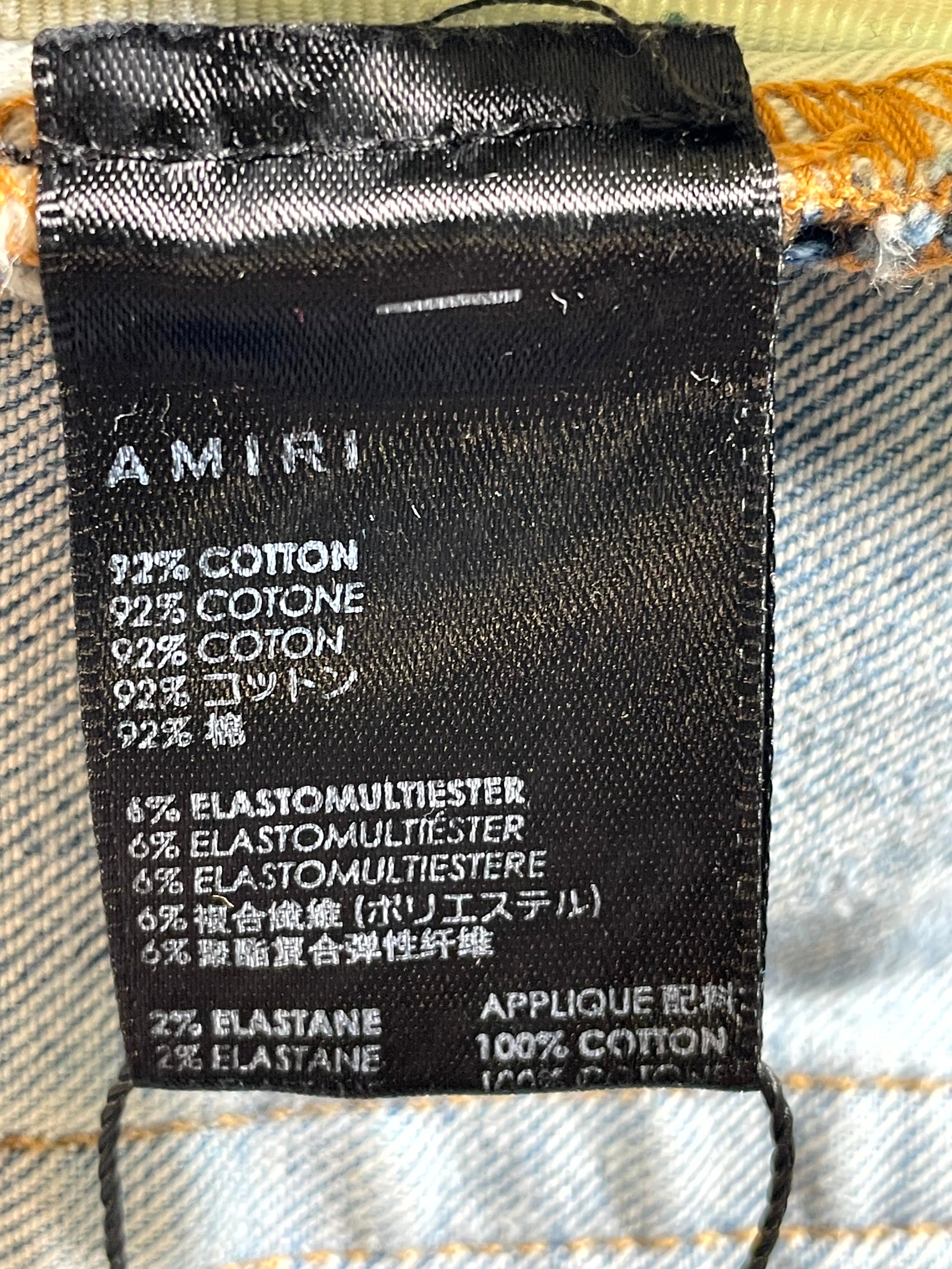 Amiri Mx1 Black Patch Light Wash Jeans
