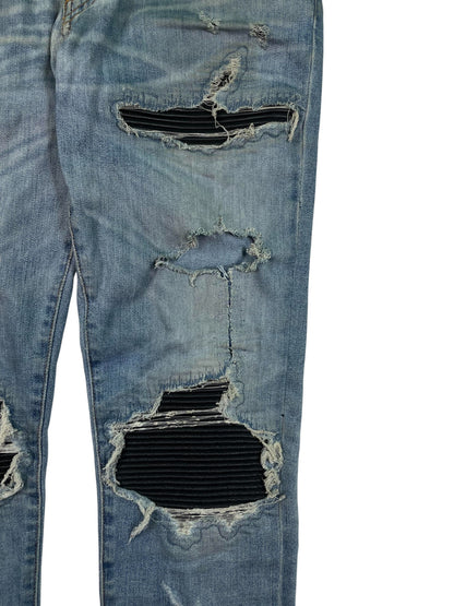 Amiri Mx1 Light Wash Black Patch Jeans