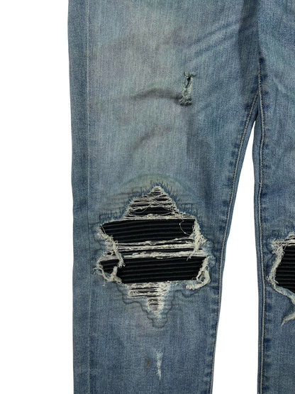 Amiri Mx1 Light Wash Black Patch Jeans