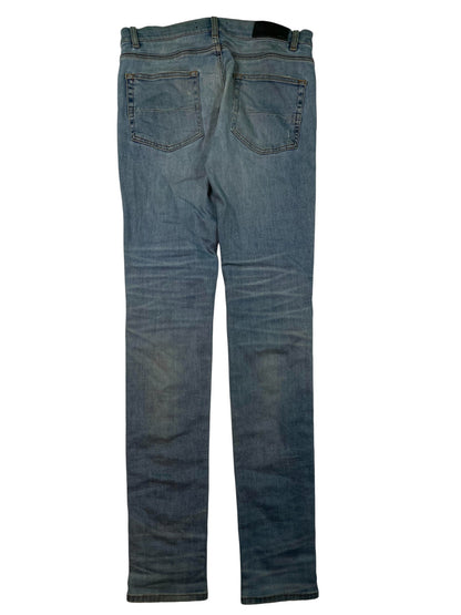 Amiri Mx1 Light Wash Black Patch Jeans