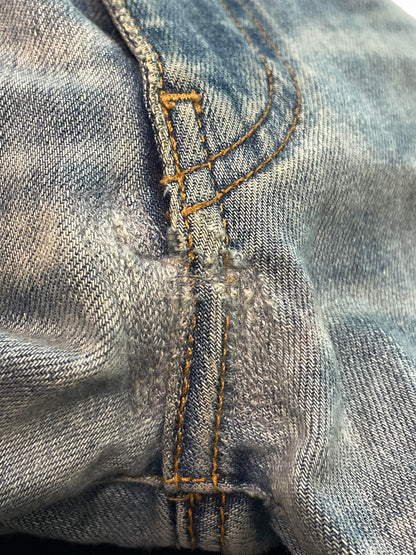 Amiri Mx1 Light Wash Black Patch Jeans