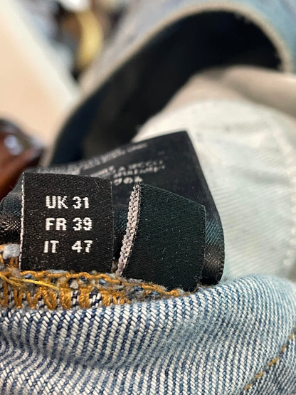 Amiri Mx1 Light Wash Black Patch Jeans