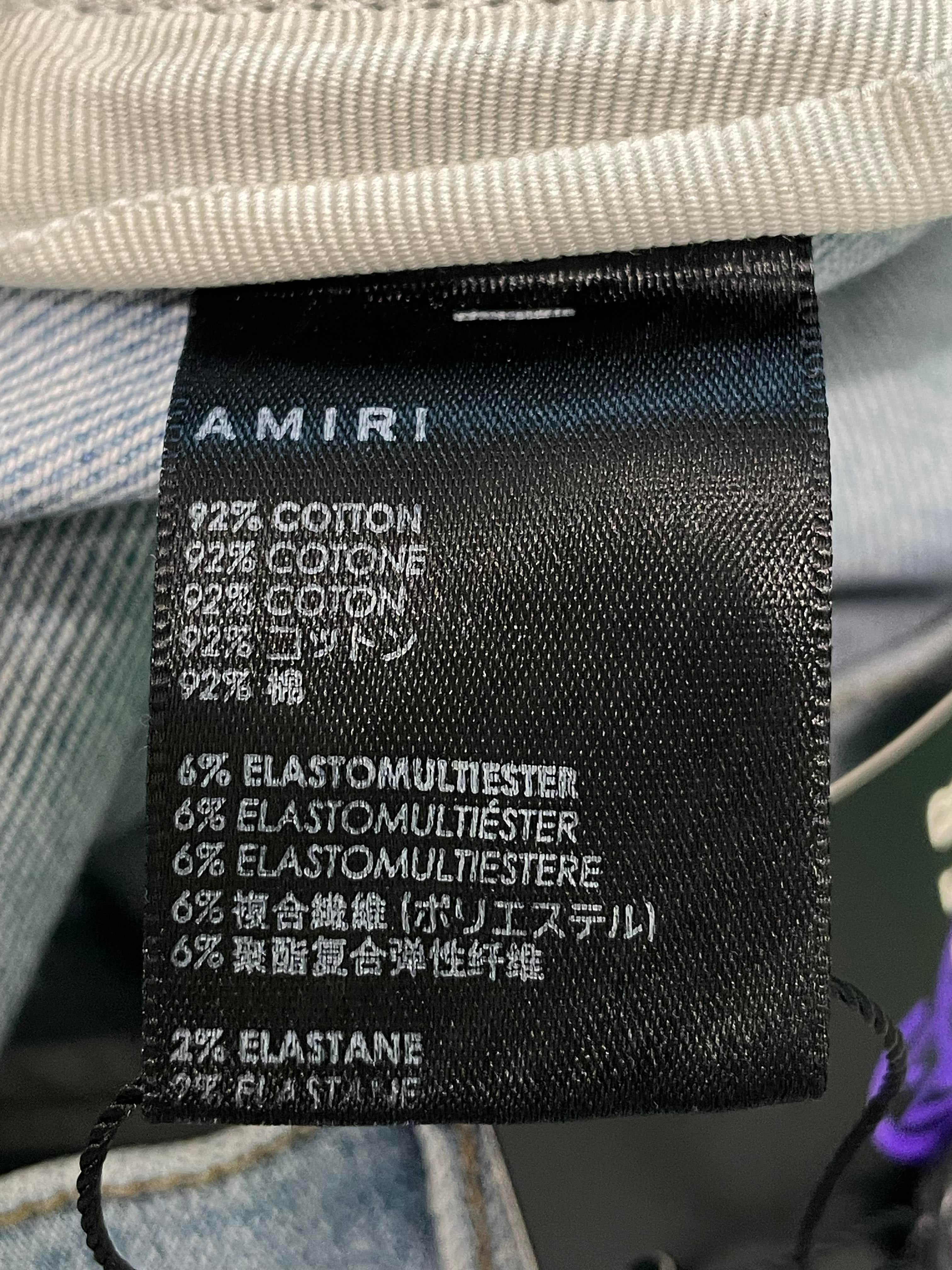 Amiri Side Logo Paint Drip Light Wash Jeans