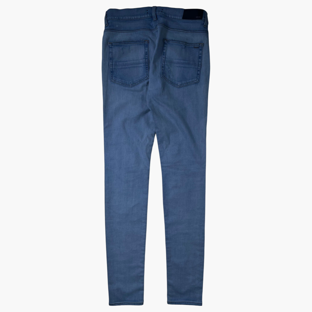 Amiri MX1 Camo Patch Light Wash Jeans