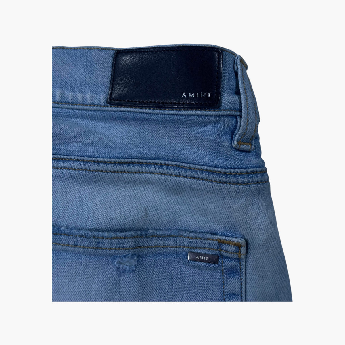 Amiri MX1 Camo Patch Light Wash Jeans