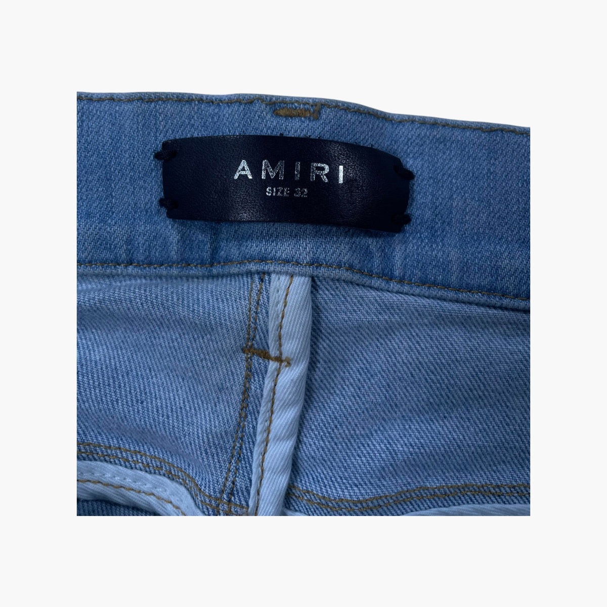 Amiri MX1 Camo Patch Light Wash Jeans