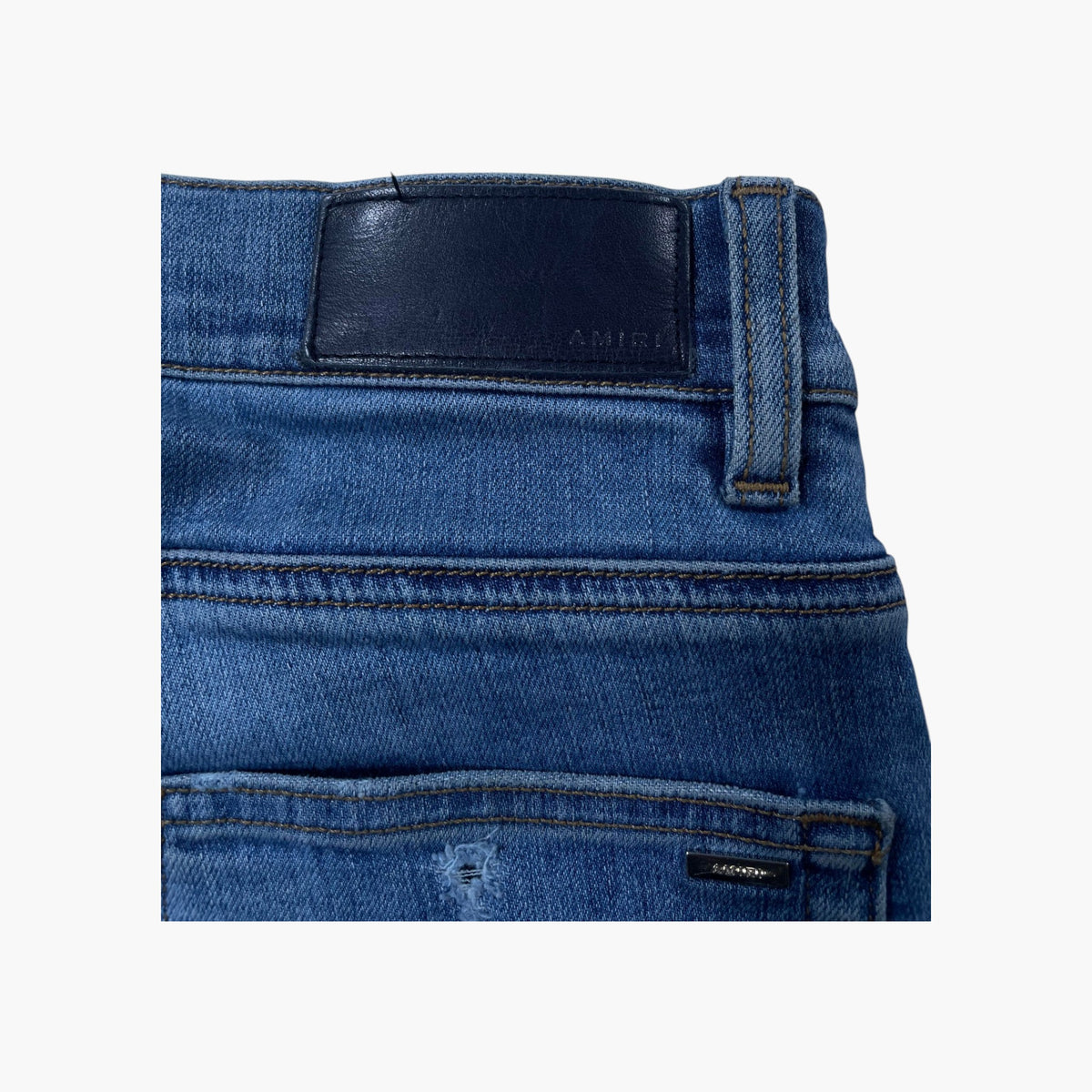 Amiri Patchwork Light Wash Floral Jeans