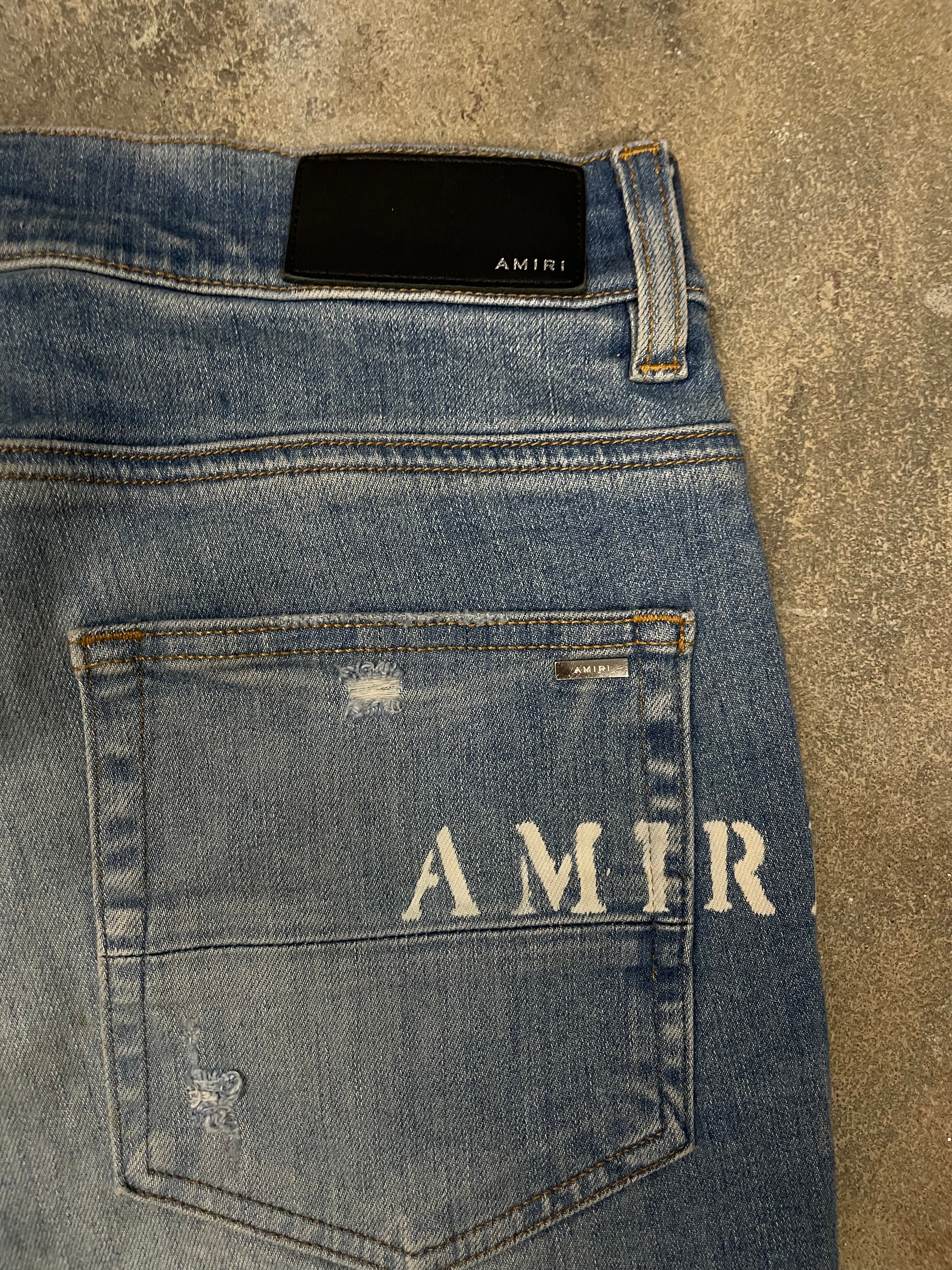Amiri Floral Thrasher Cream Light Wash Jeans