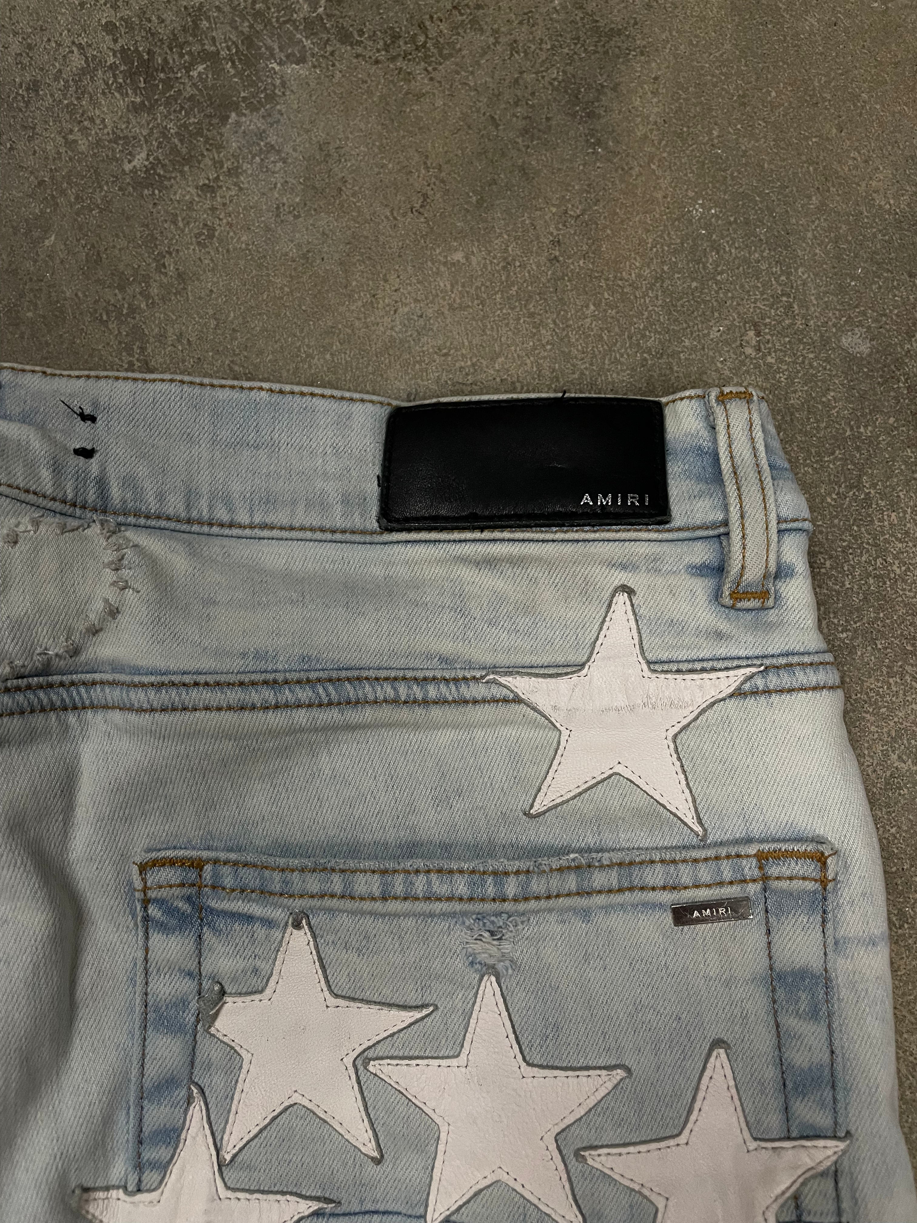 Amiri Chemist Light Wash White Stars Jeans