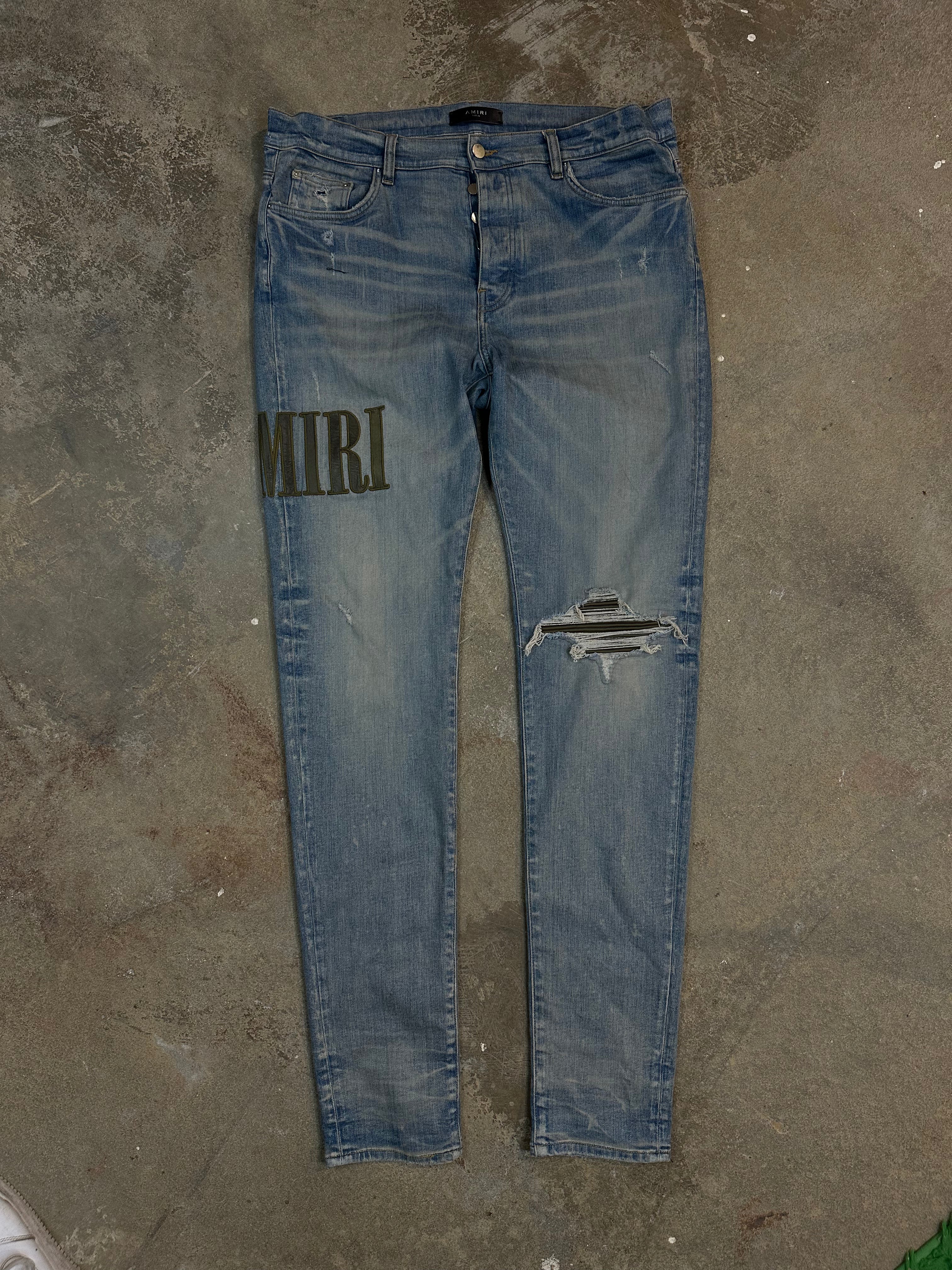 Amiri MX1 Light Wash Camo Side Logo Used 38