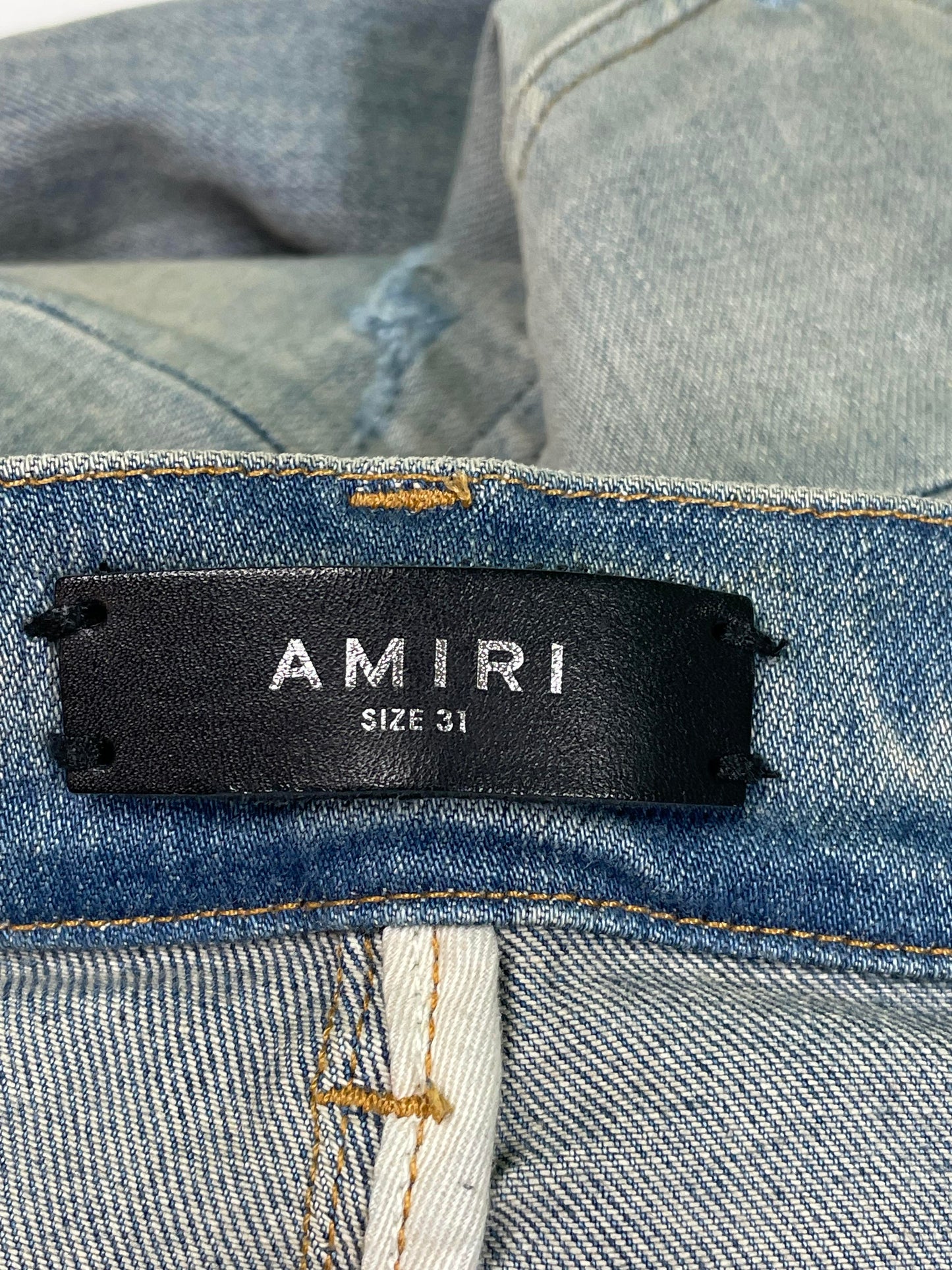 Amiri MX1 Light Wash Orange Crackle Jeans