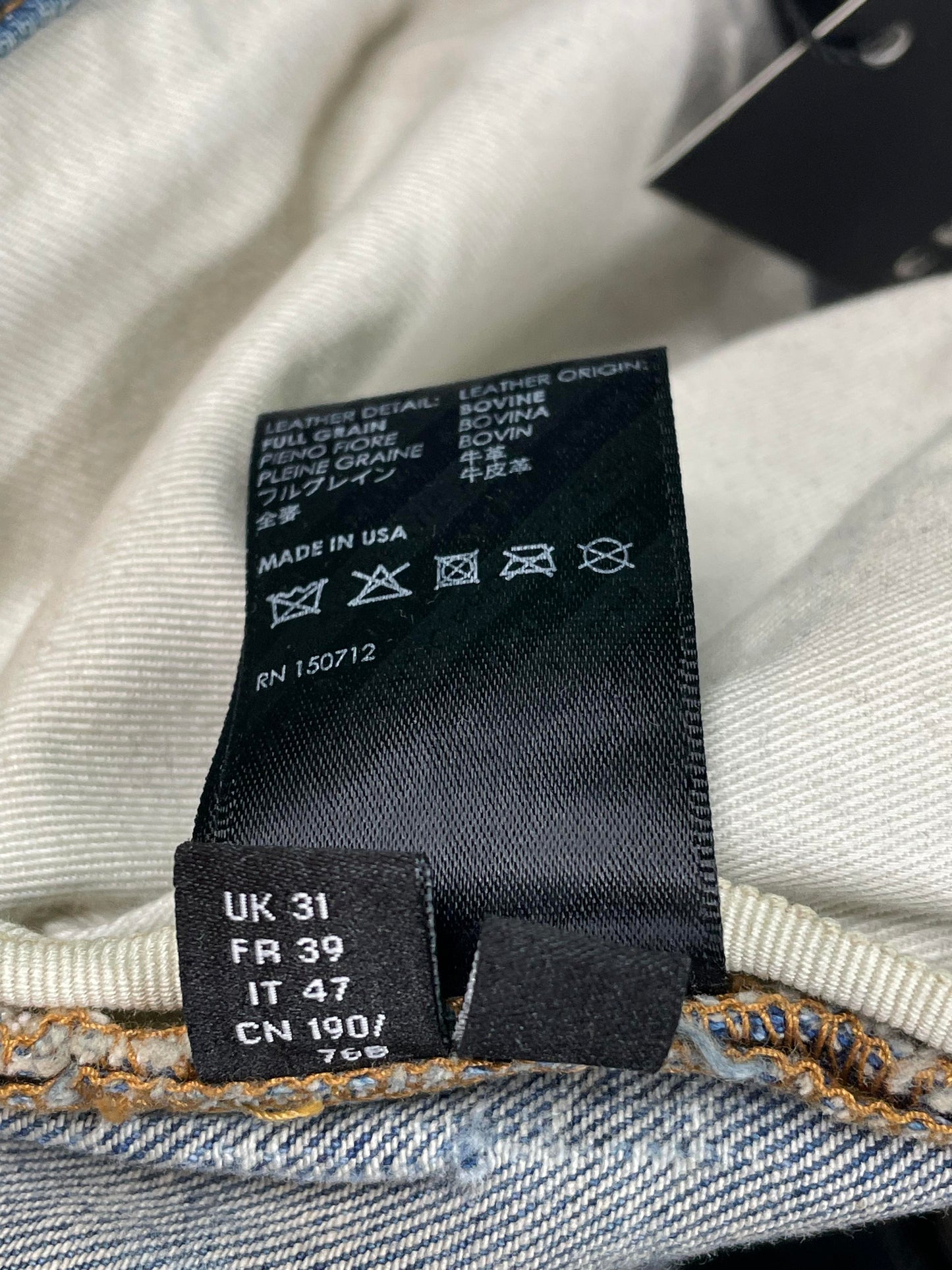 Amiri MX1 Light Wash Orange Crackle Jeans