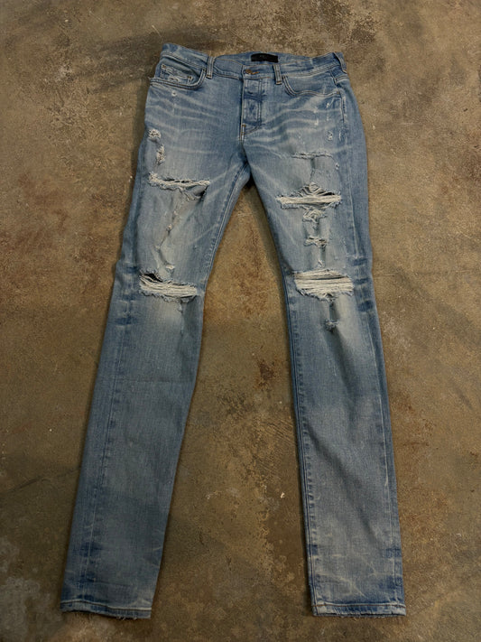 Amiri Lightwash Ripped Thrasher Jeans Used 33
