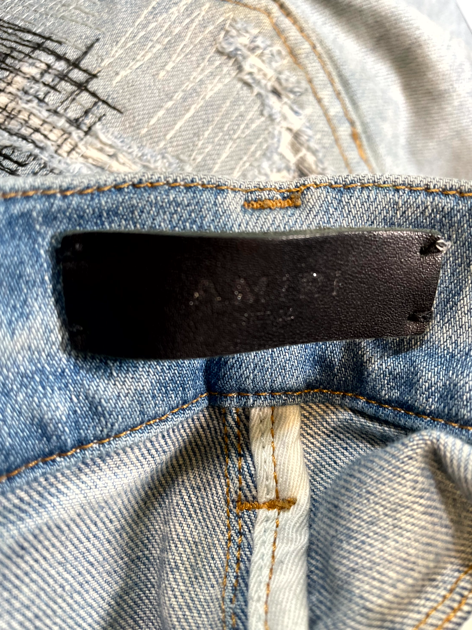 Amiri Multi Stitch Light Wash Jeans