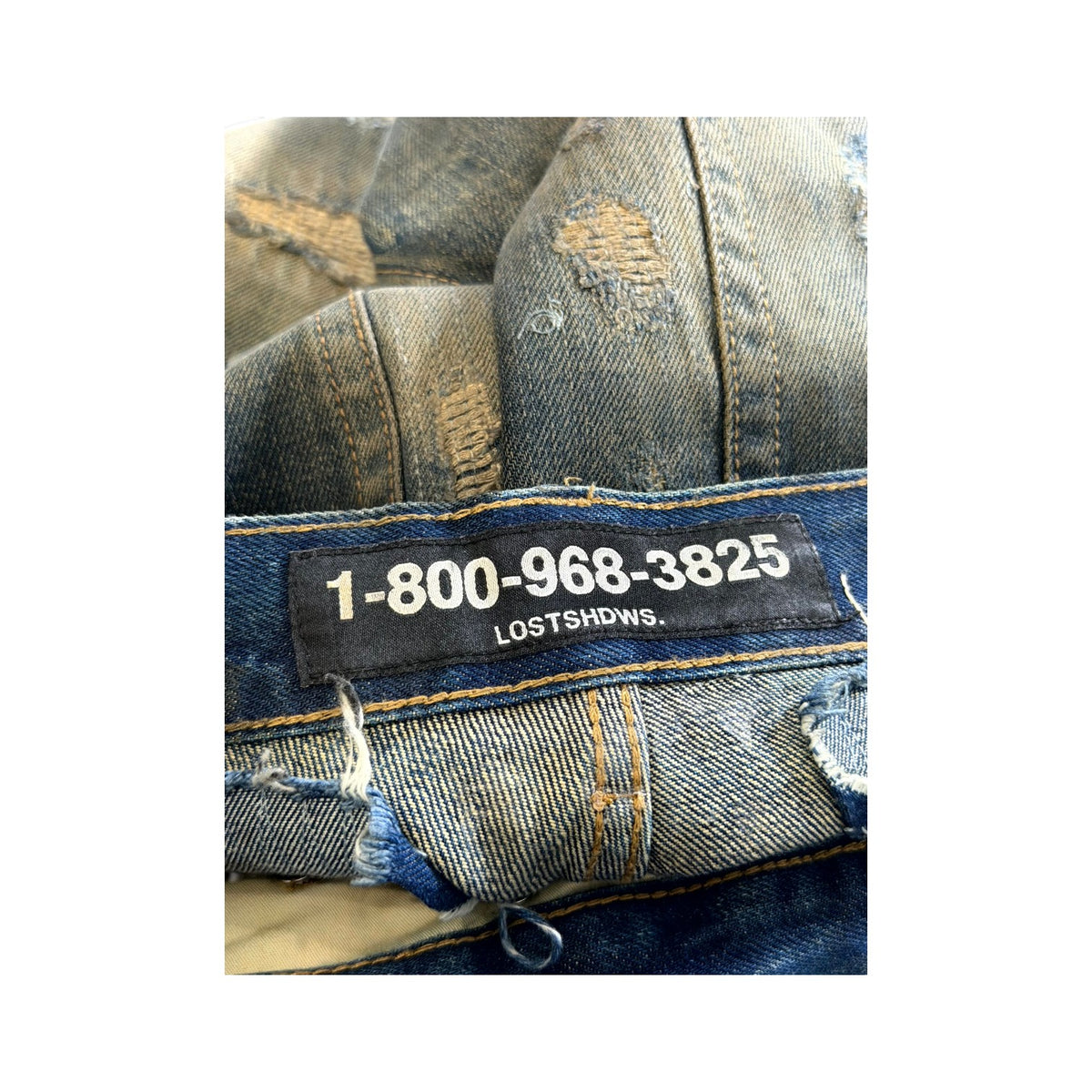 LOST SHDWS Waxed Distressed Navy Jeans