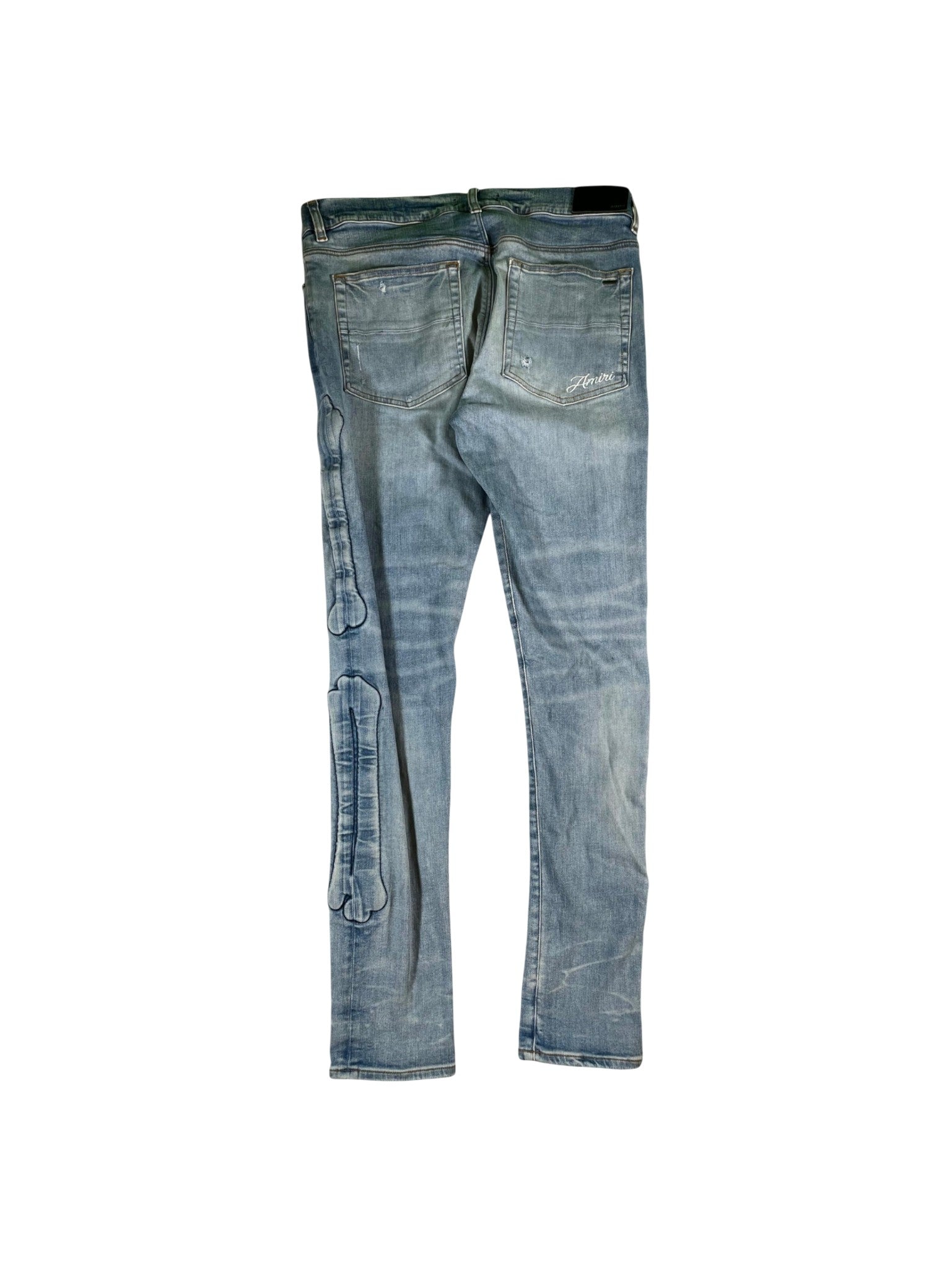 Amiri "Bone Embossed" Light Wash Jeans