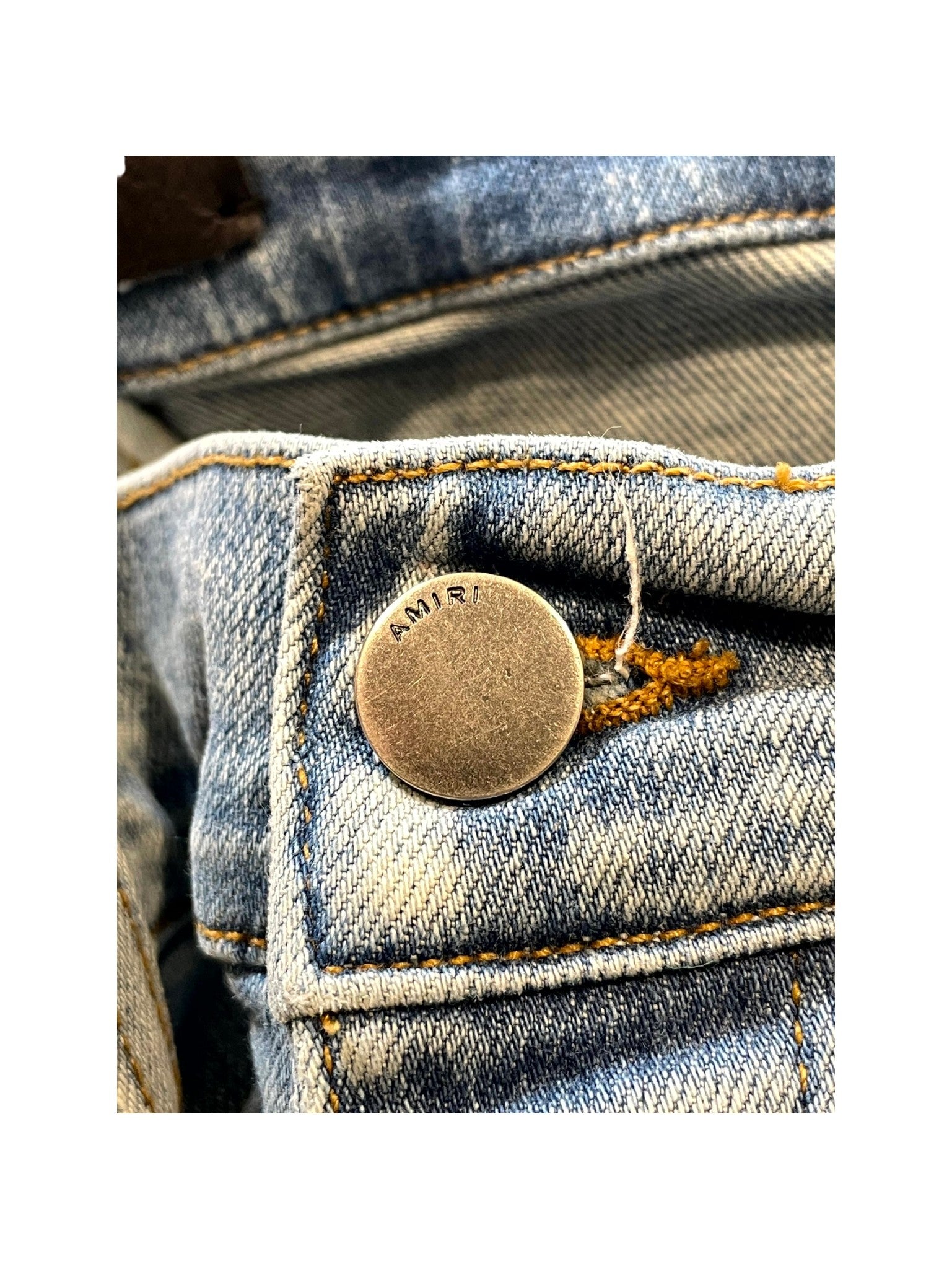 Amiri "Bone Embossed" Light Wash Jeans
