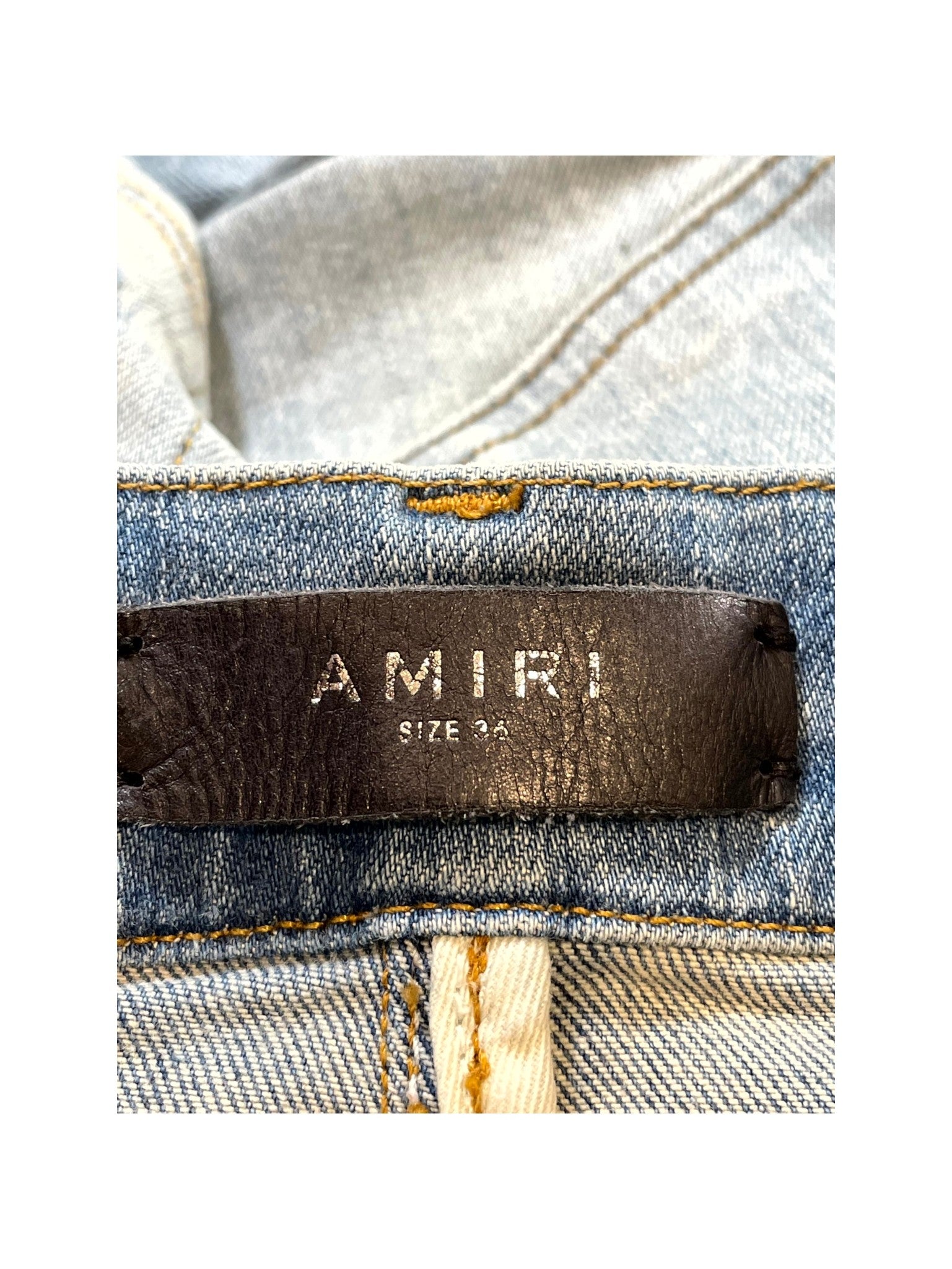 Amiri "Bone Embossed" Light Wash Jeans