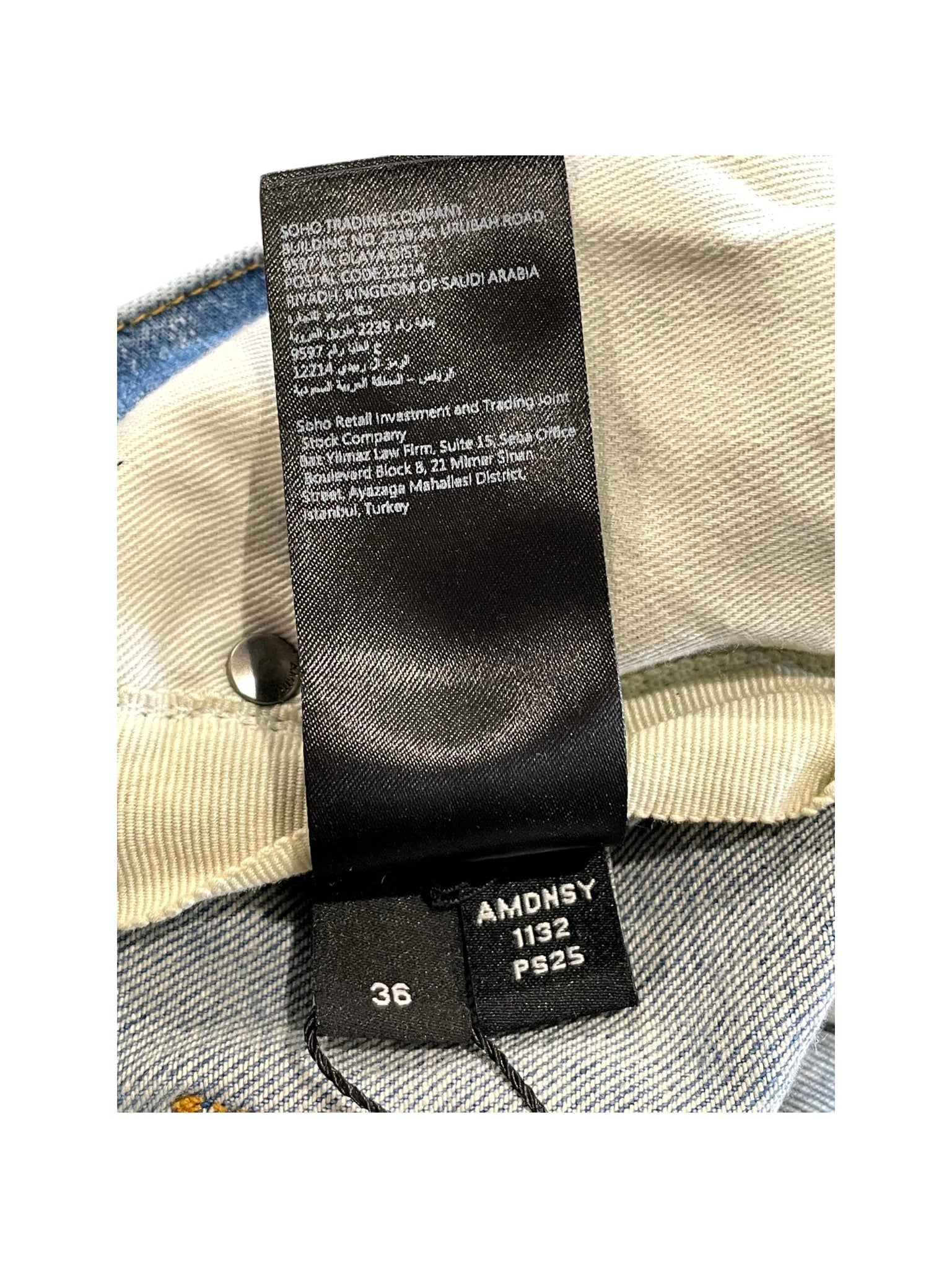 Amiri "Bone Embossed" Light Wash Jeans