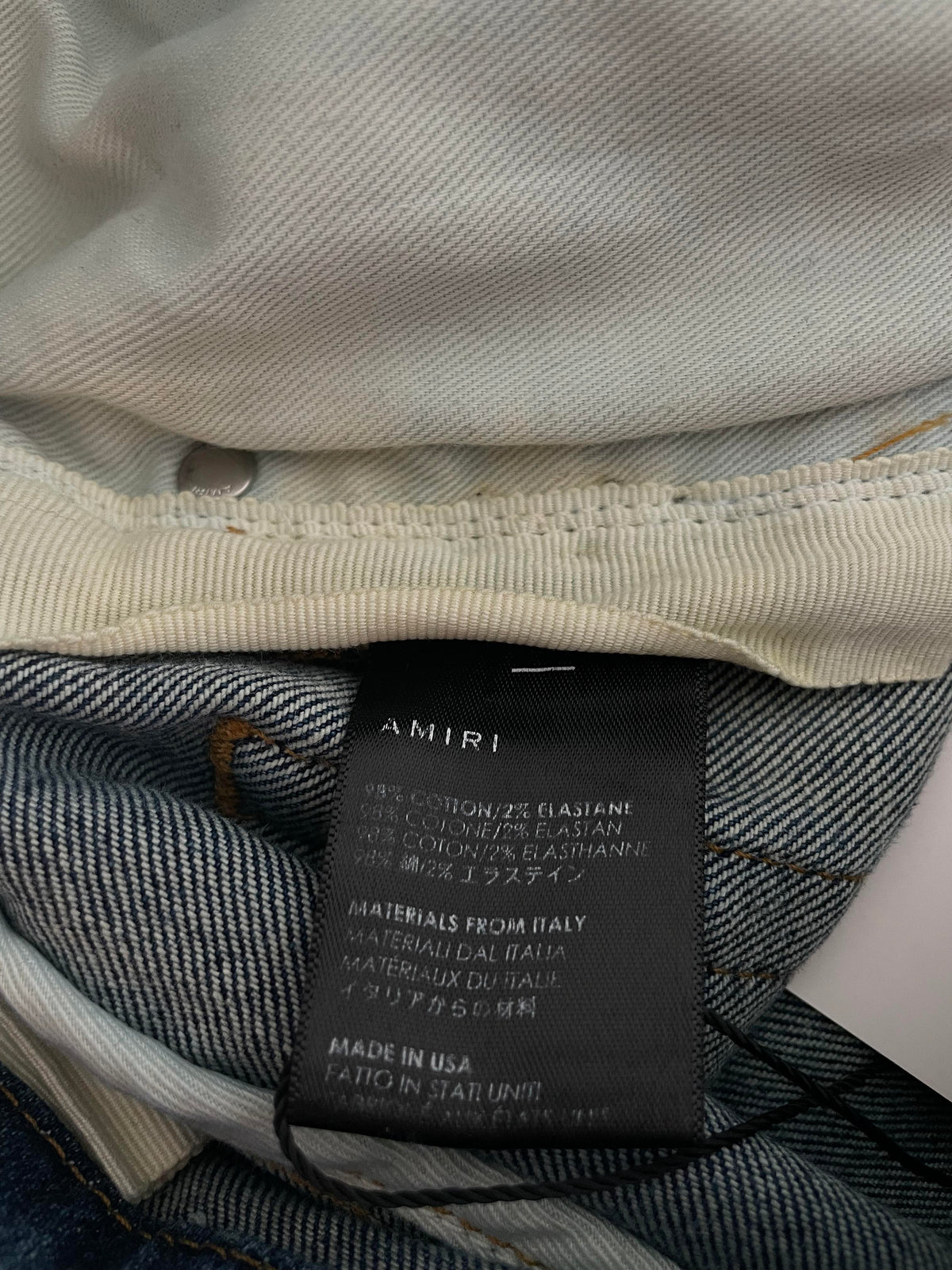 Amiri Studded Thrasher Rust Indigo Jeans