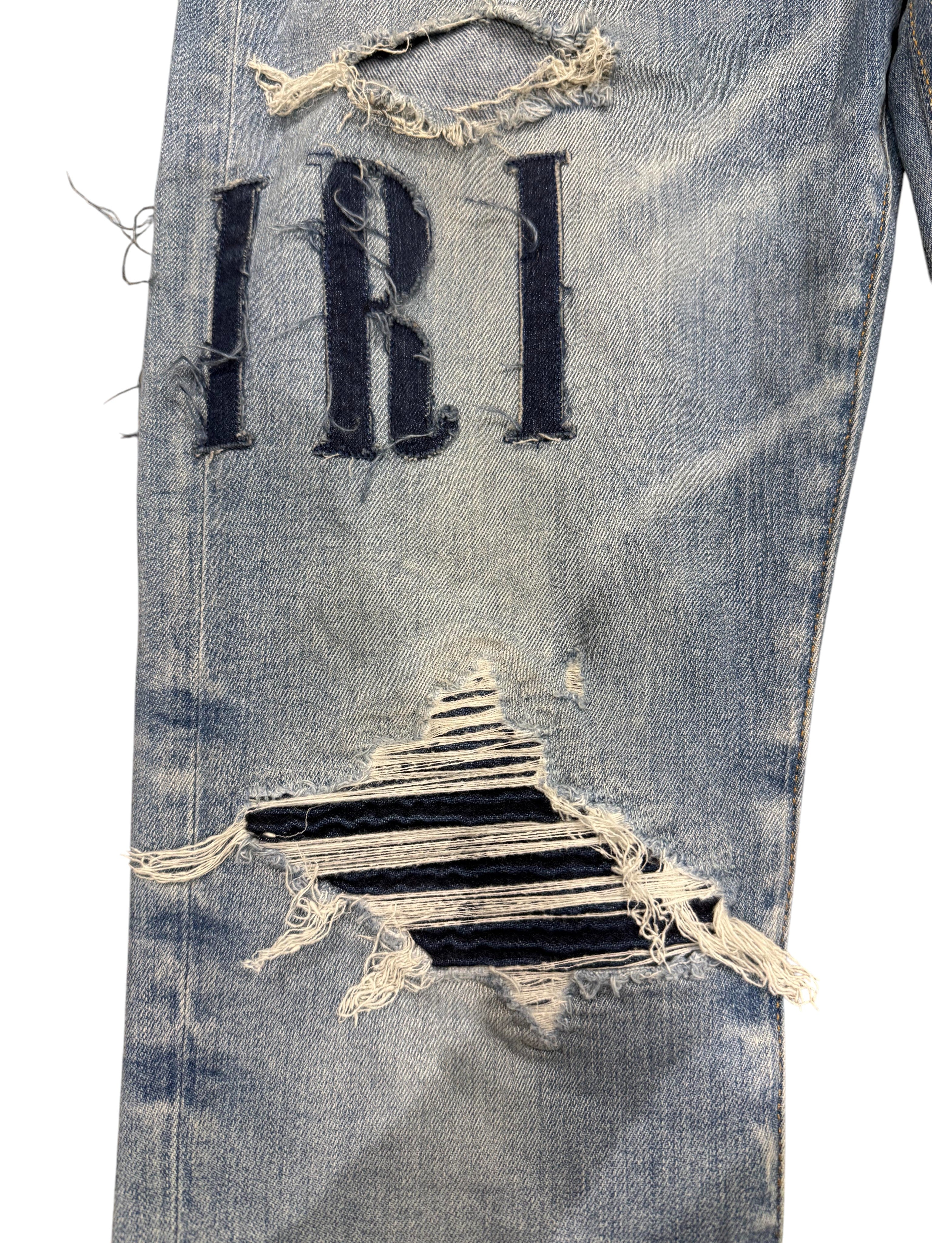Amiri MX1 Applique Light Wash Denim Jeans