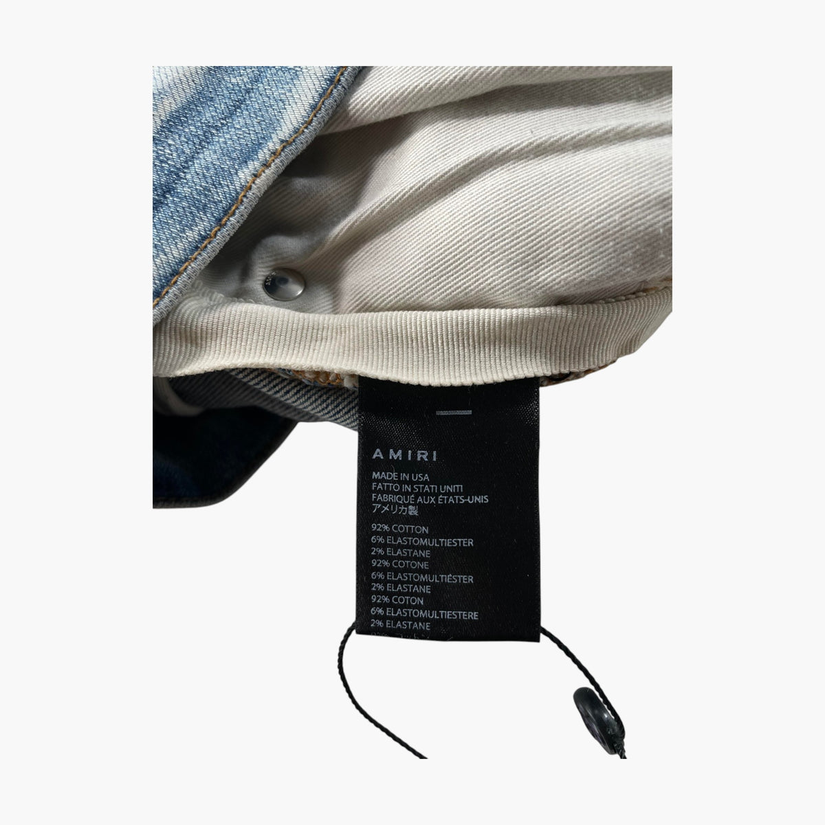 Amiri Cow Hide Cheetah Thrasher Light Wash Jeans