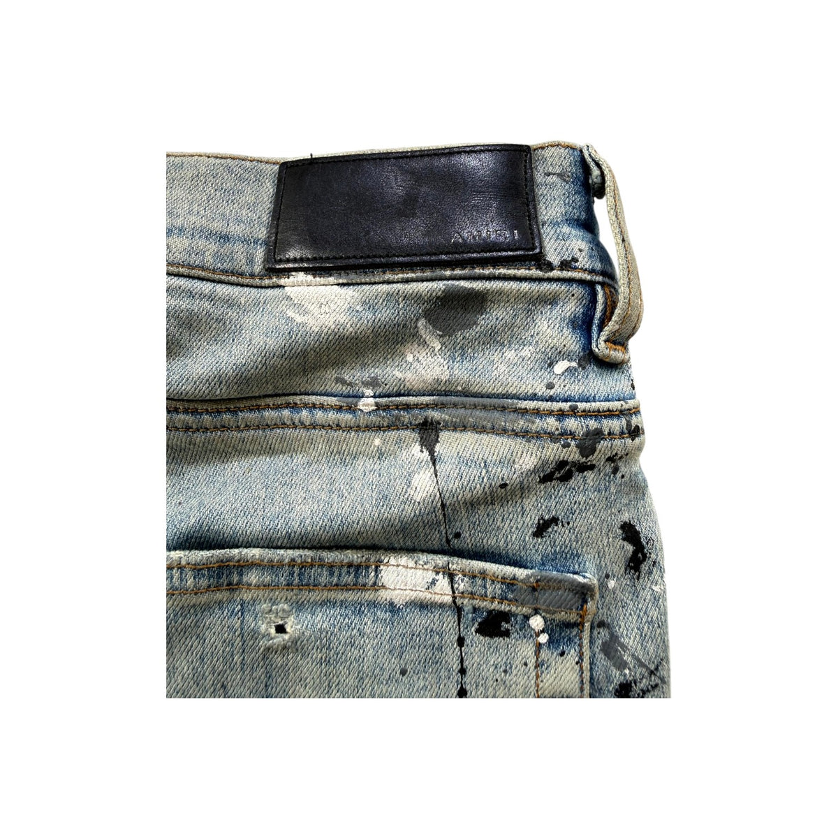 Amiri "MX1" Denim Paint Splatter Light Wash Jeans