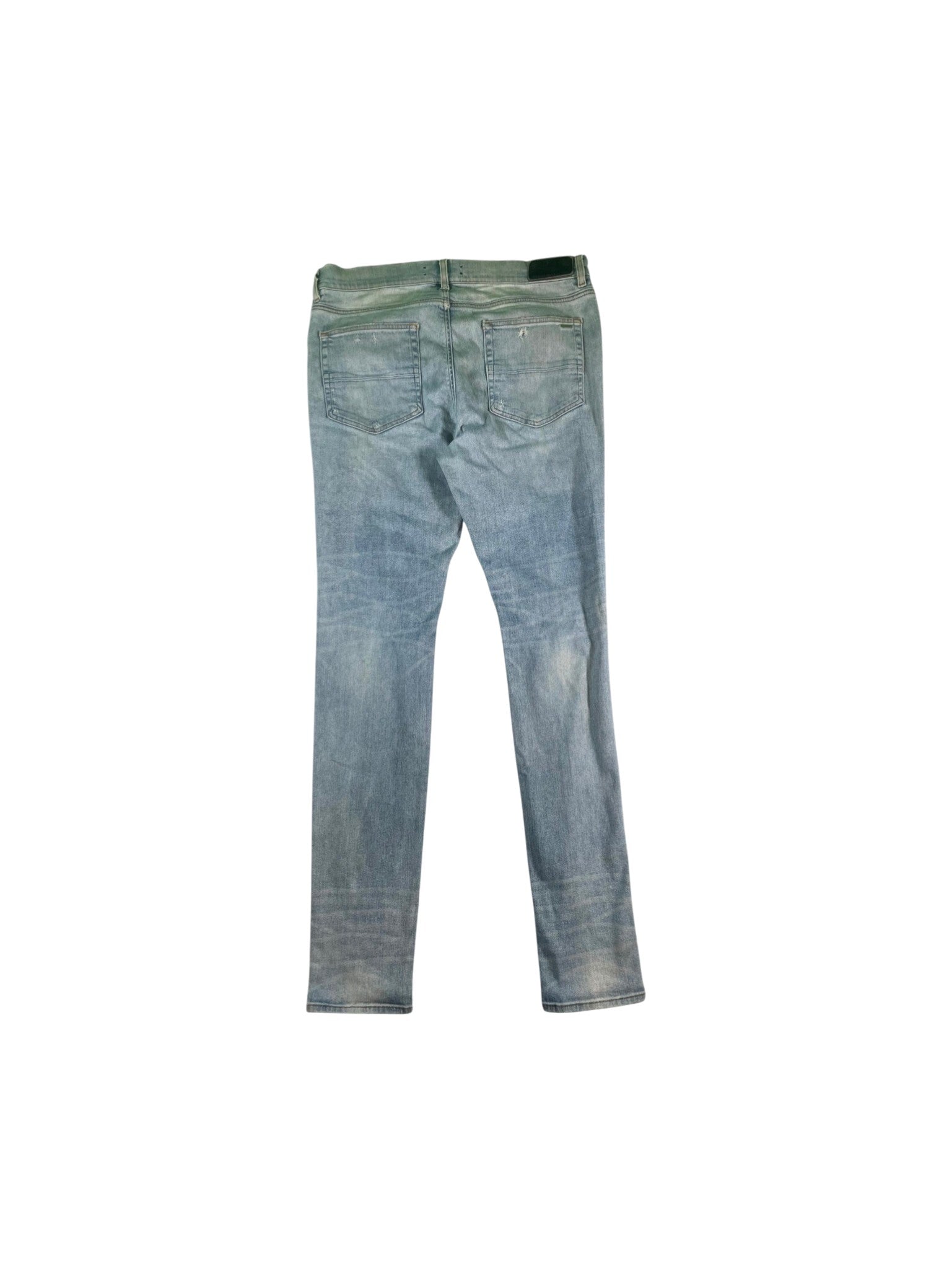 Amiri Ripped Thrasher Light Wash Jeans