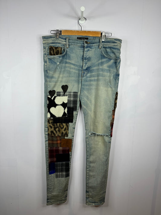 Amiri Jeans Lumberjack Patchwork Light Wash Blue Jeans