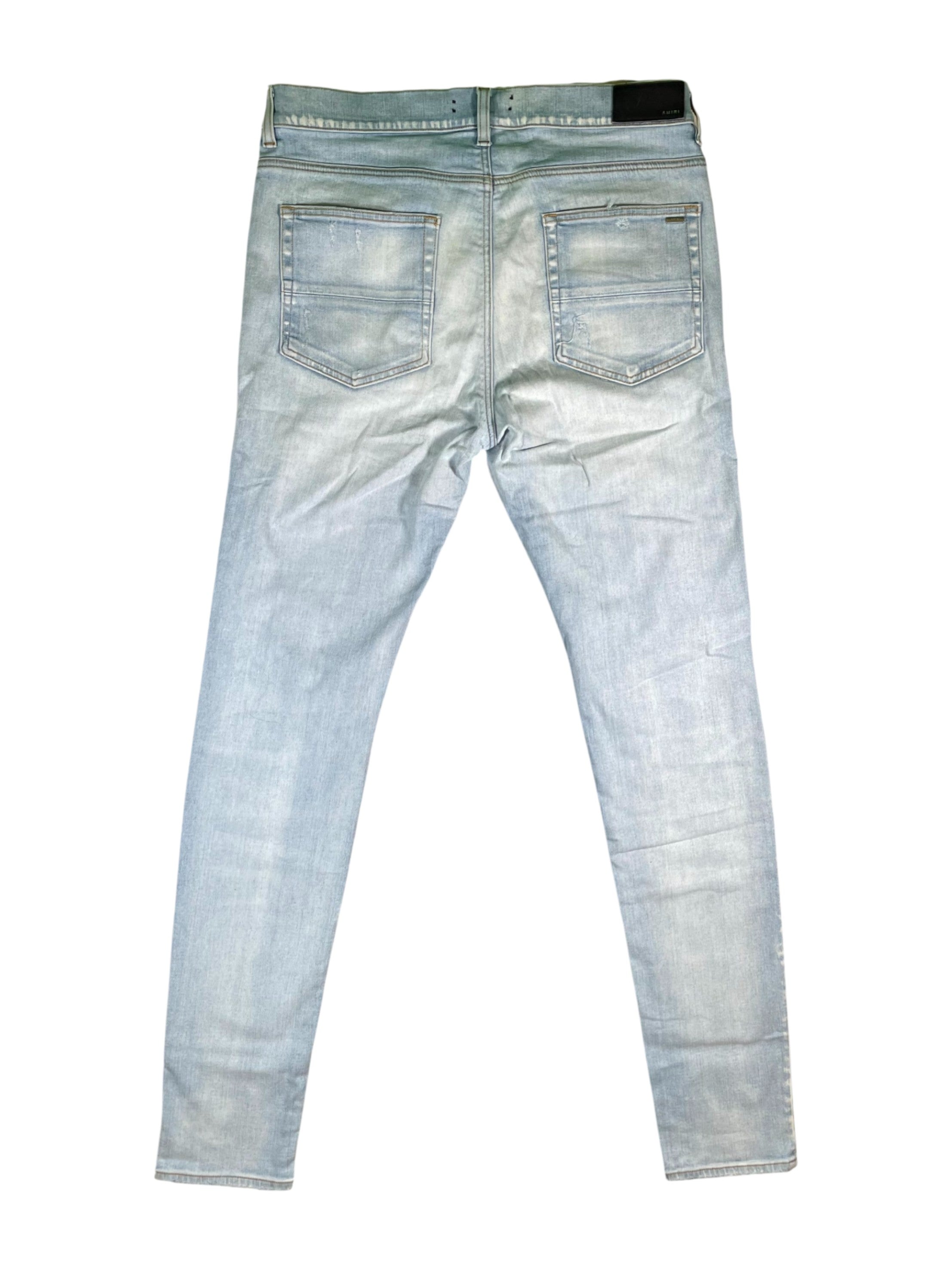 Amiri MX1 Camo Patch Light Wash Jeans