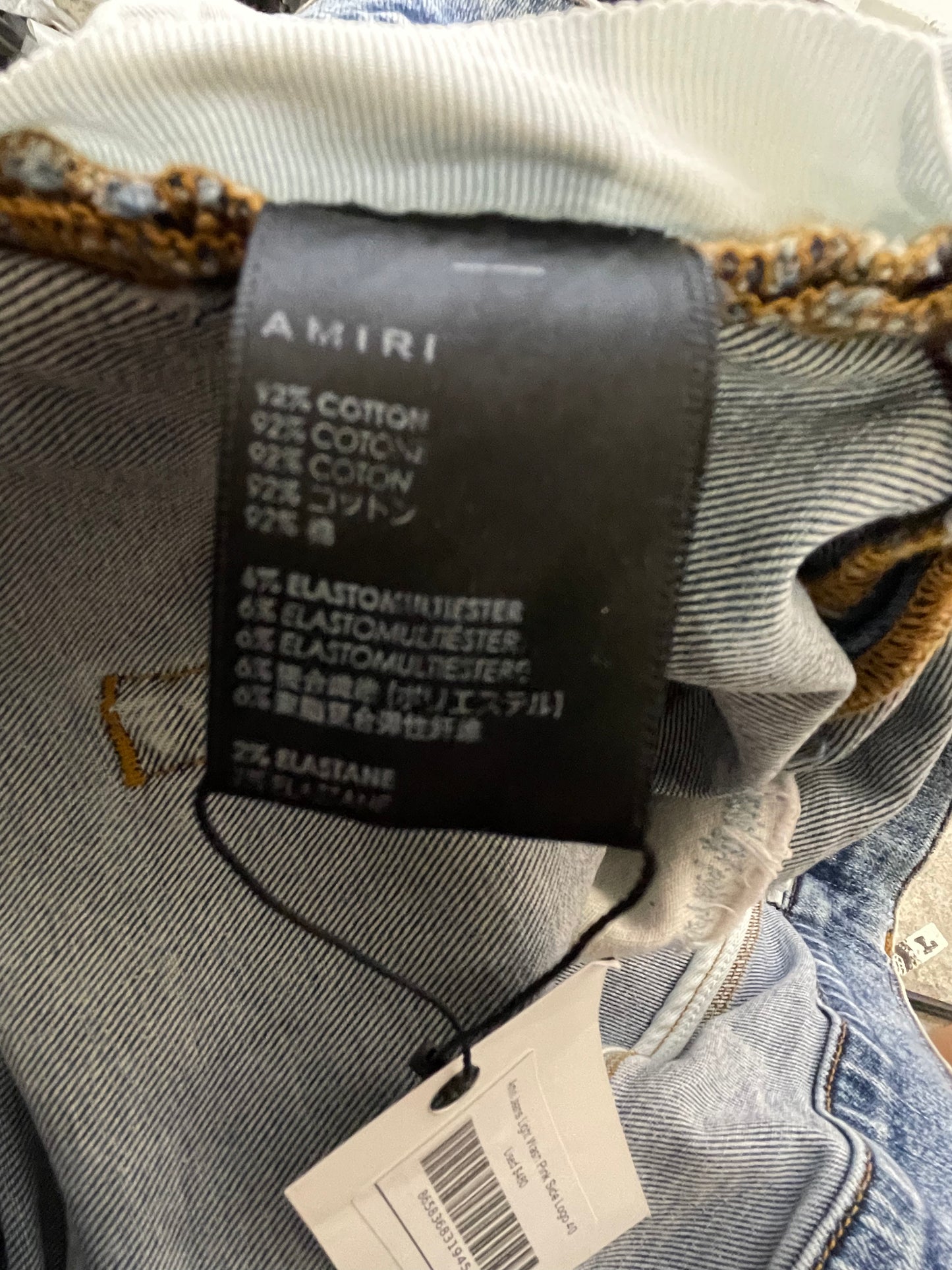 Amiri Pink Side Logo Light Wash Blue Jeans